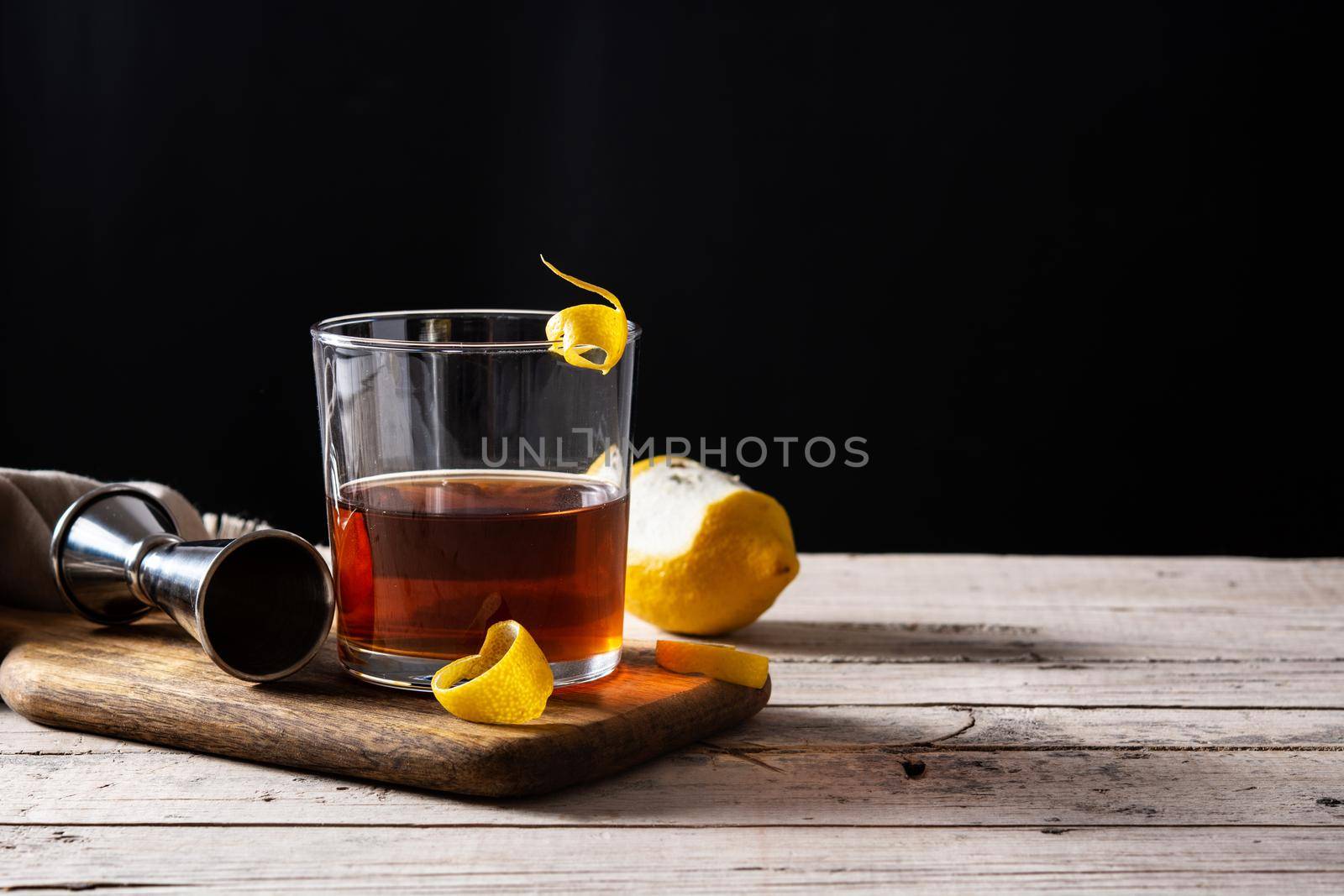 New Orleans sazerac cocktail on wooden table