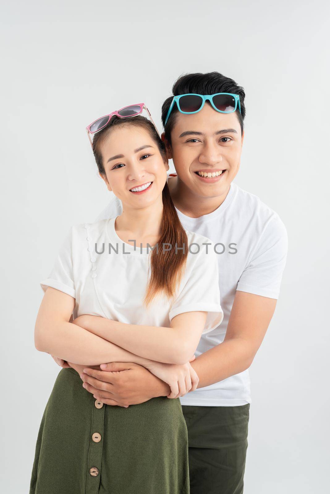happy couple embracing, isolated on white background, man in glasses, Positive emotion facial expression