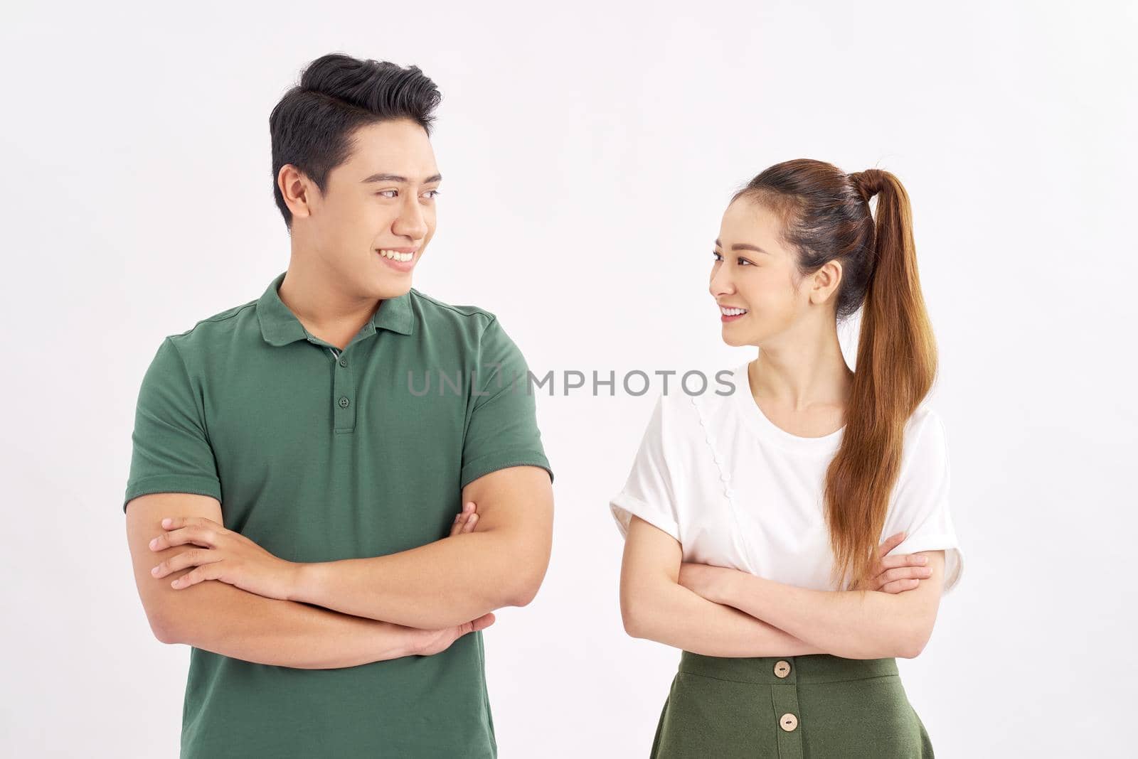 Happy smiling couple in love. Over white background