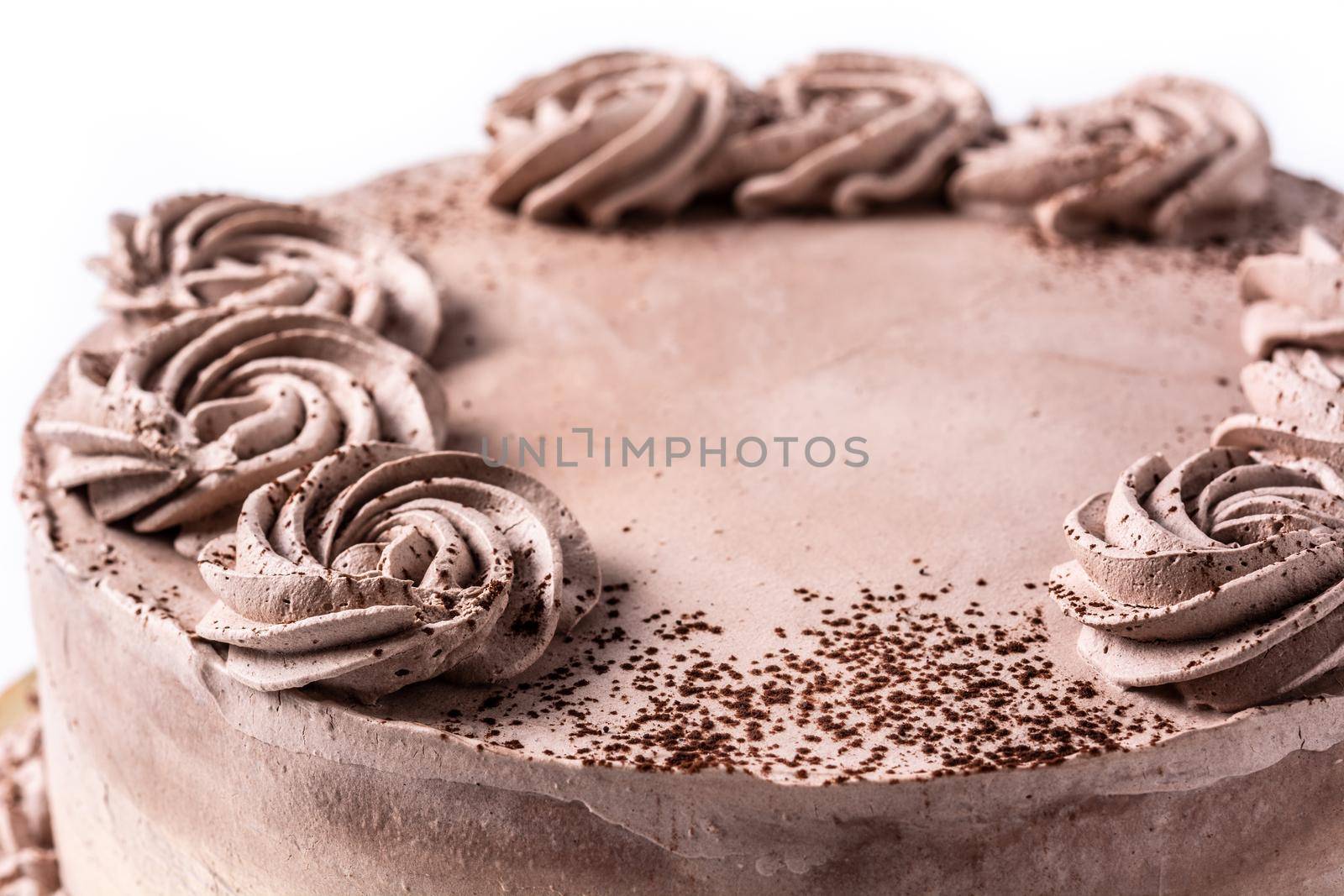 Piece of chocolate truffle cake isolated on white background