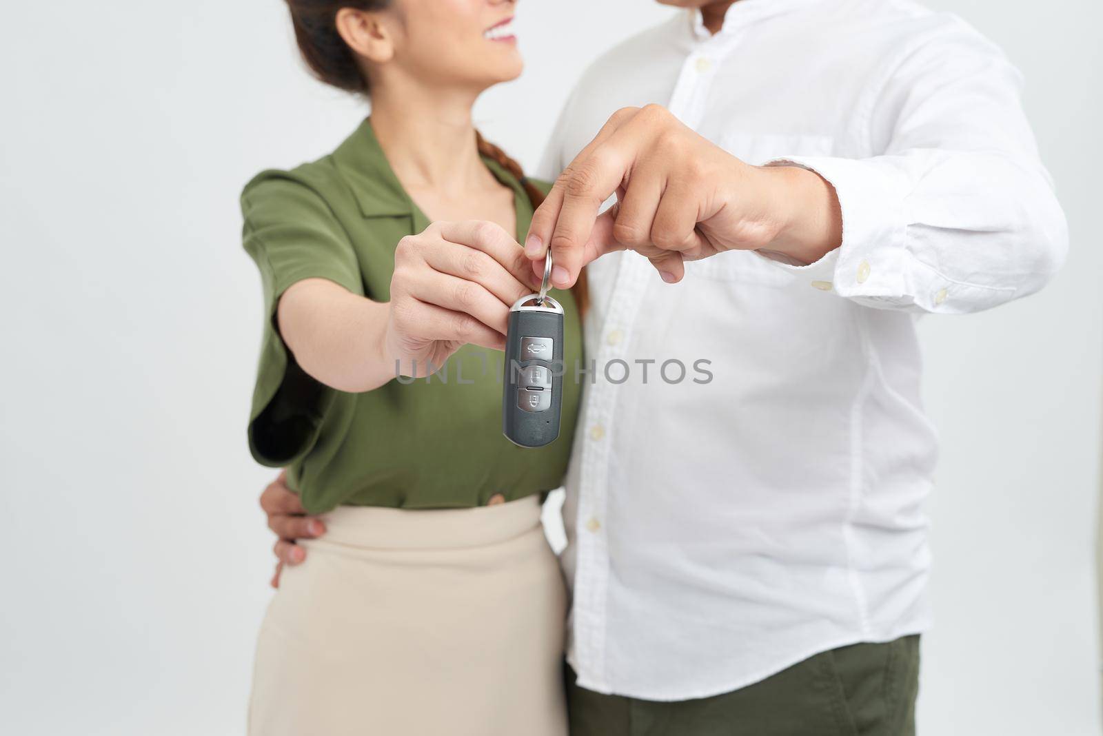 Couple holding brand new car key