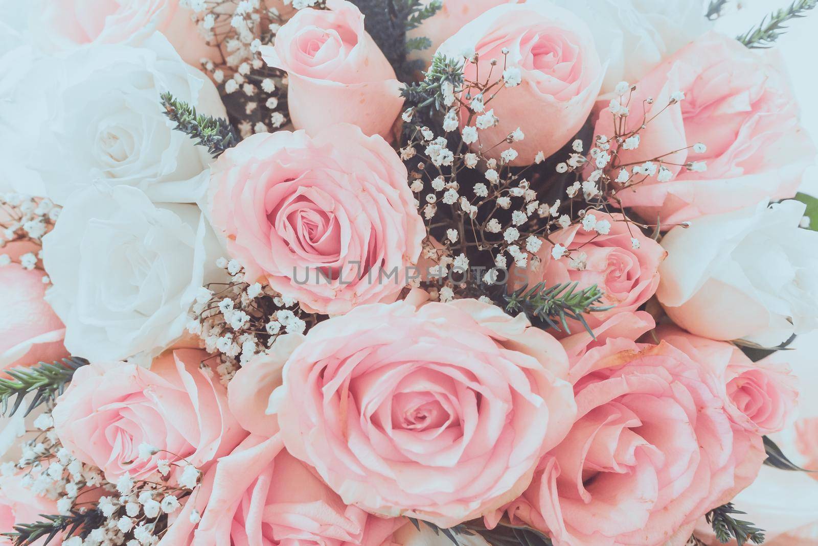 Vintage style - Abstract escalator of shopping mall, shallow depth of focus.- Pink roses well use as a wedding or valentine background