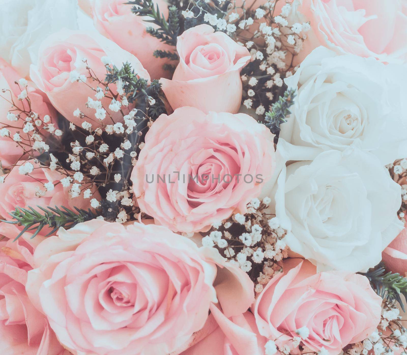 Vintage style - Abstract escalator of shopping mall, shallow depth of focus.- Pink roses well use as a wedding or valentine background by Benzoix