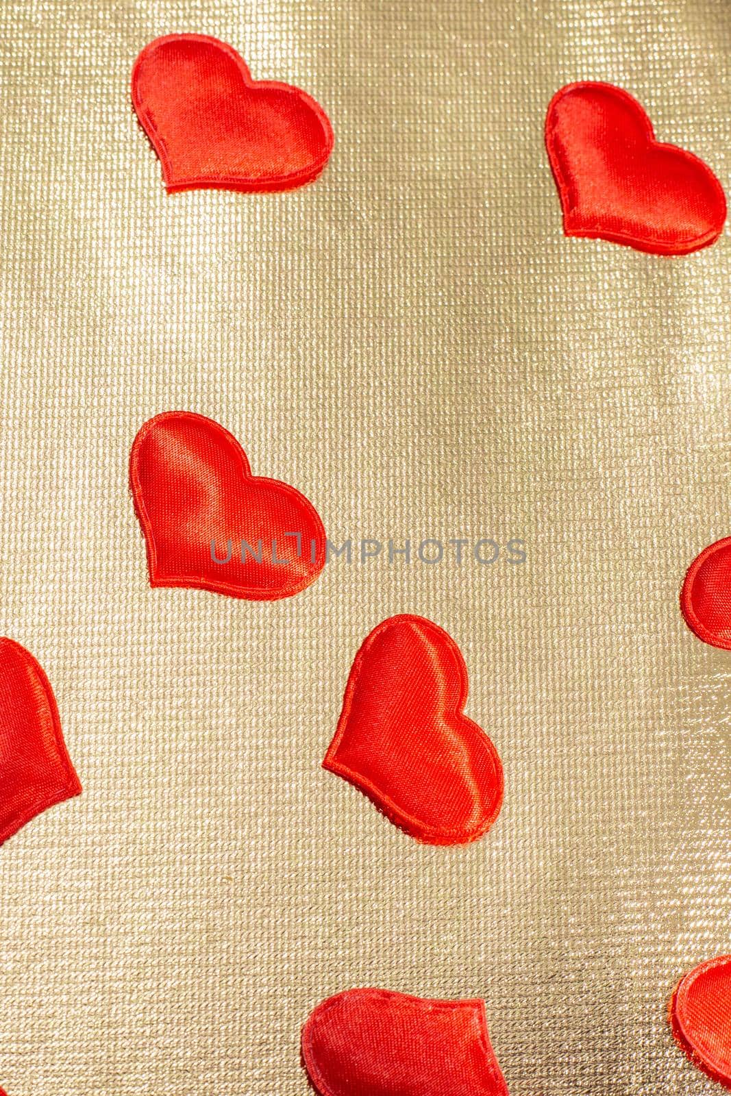 red hearts on a golden background, vertical layout