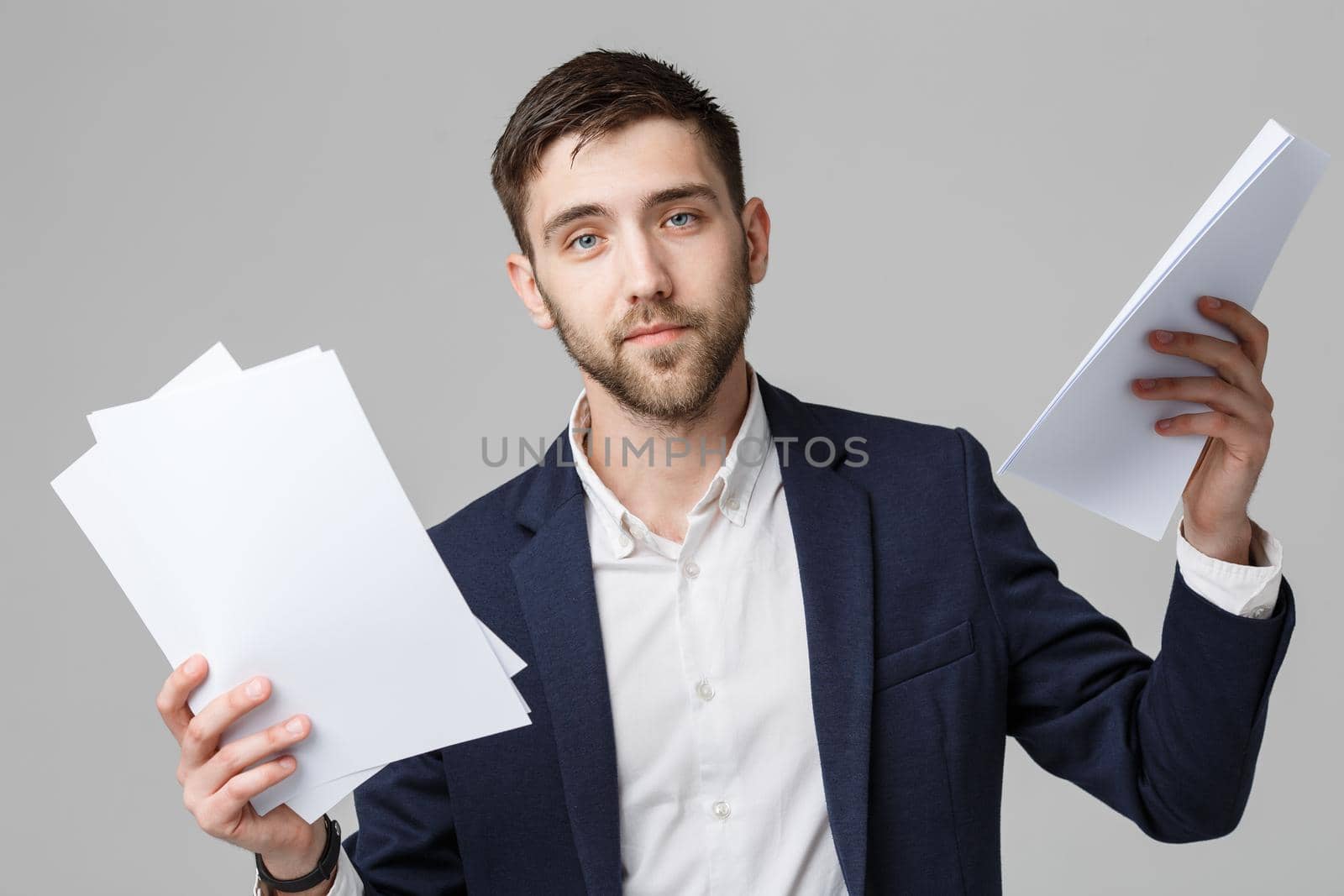 Business Concept - Portrait Handsome Business man serious working with annual report. isolated White Background. Copy space.