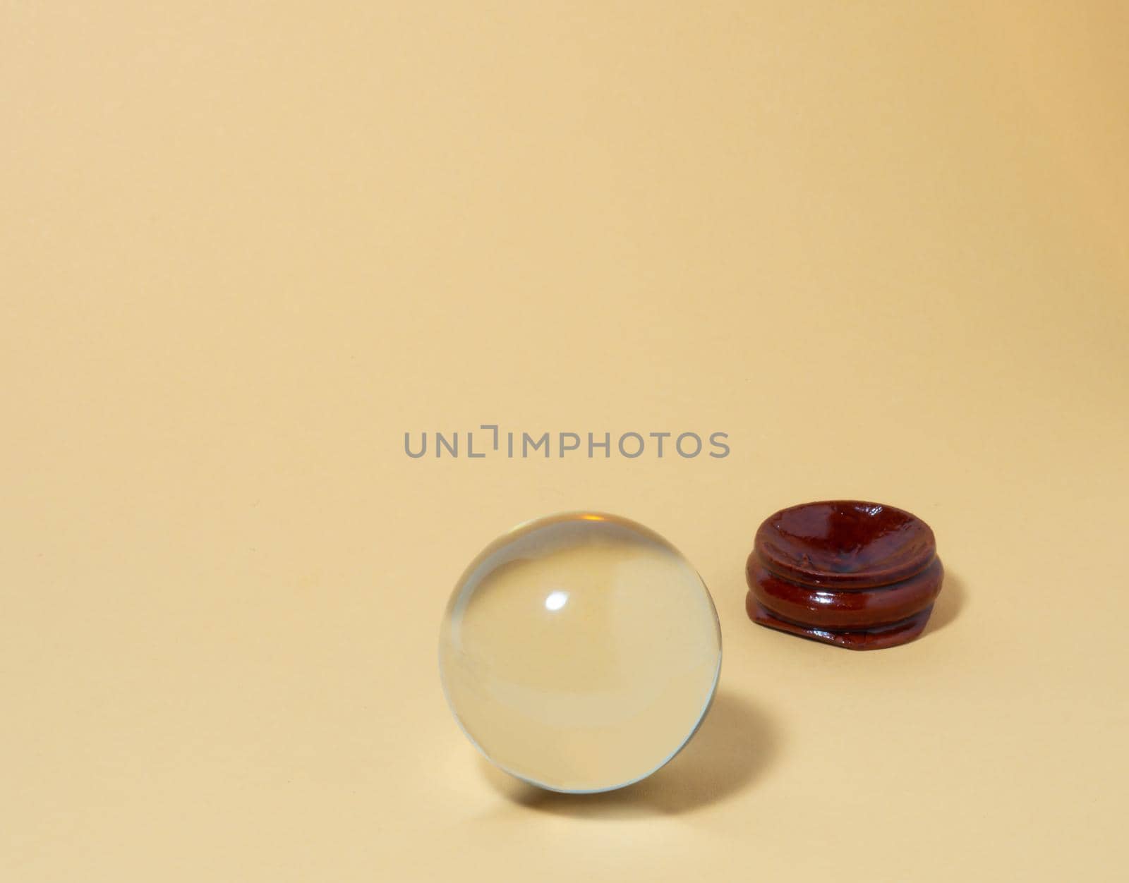Crystal ball on a yellow background. by Puludi