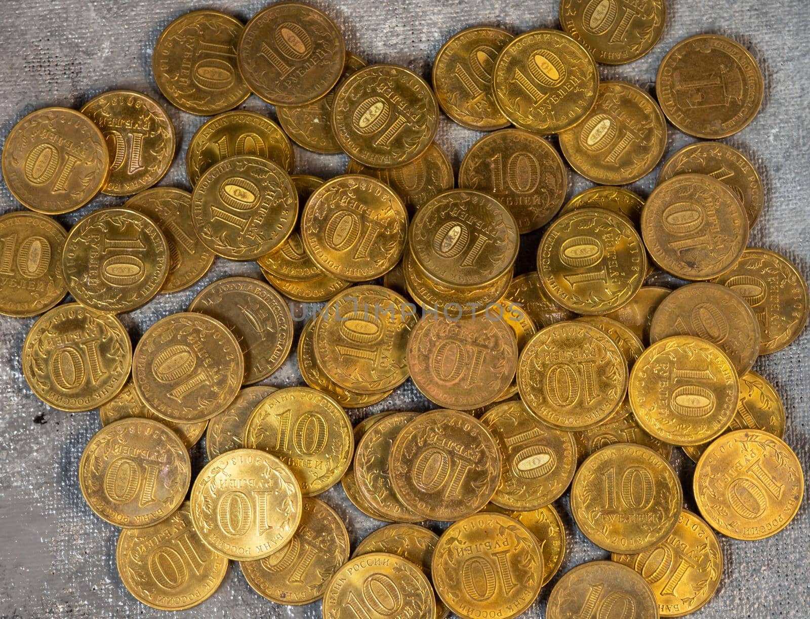 A scattering of coins. A pattern from money. Coin background