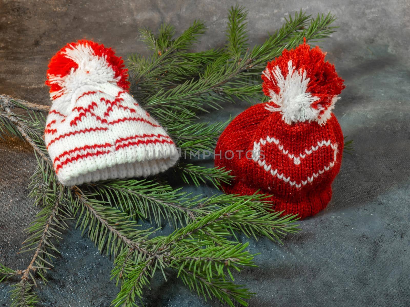 Christmas hats  on fir branches. Christmas decoration. New Year's atmosphere.  
