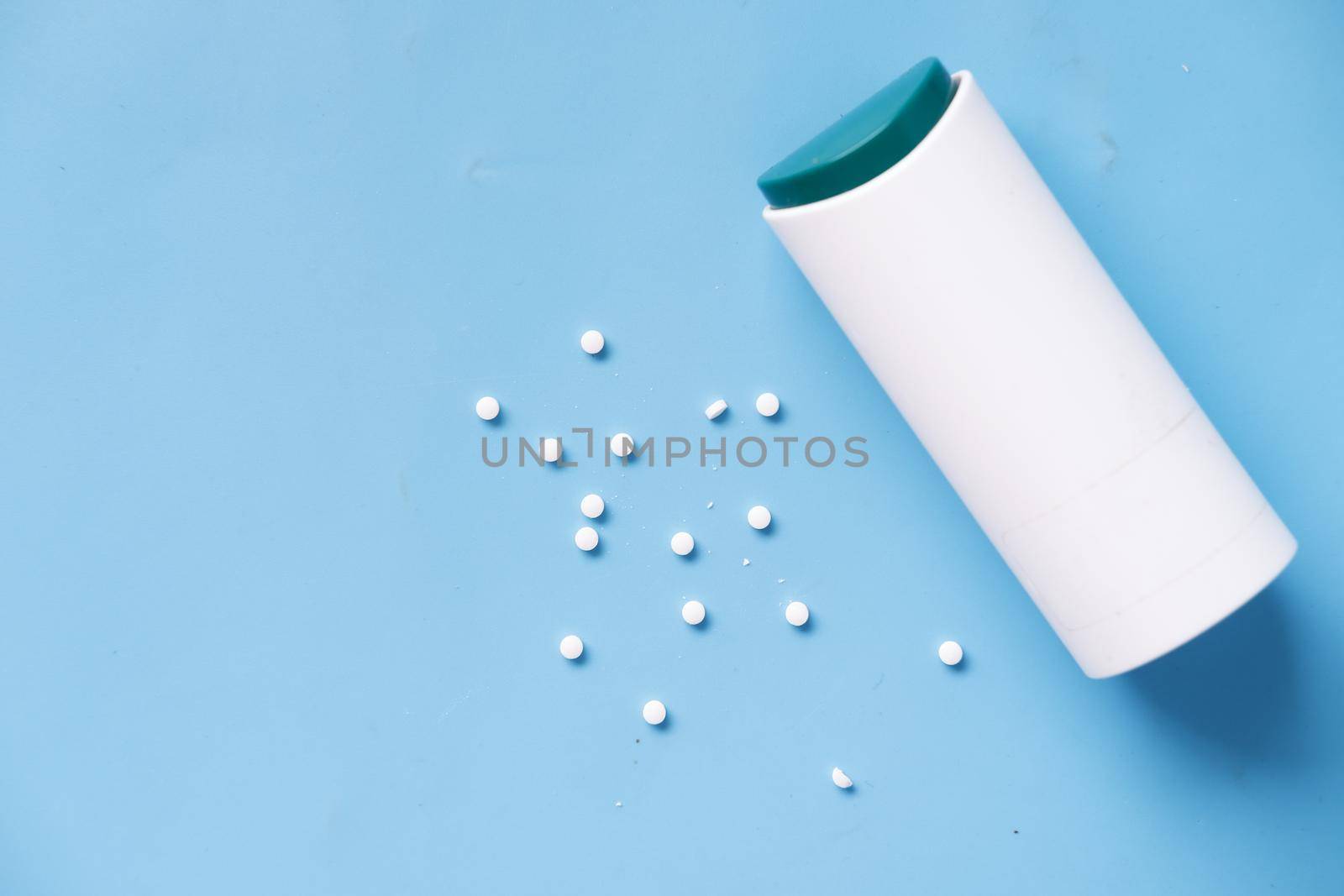 artificial sweetener container on table .