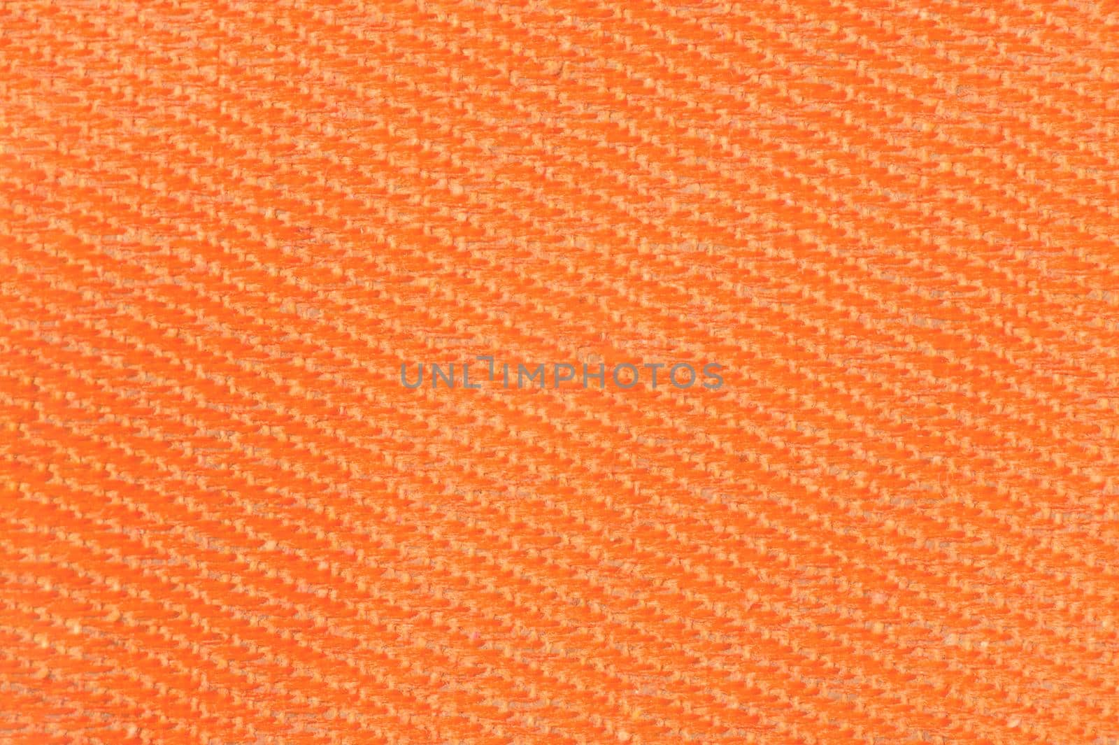 Orange canvas fabric texture background. Textile and decoration concept. Wallpaper and interior design