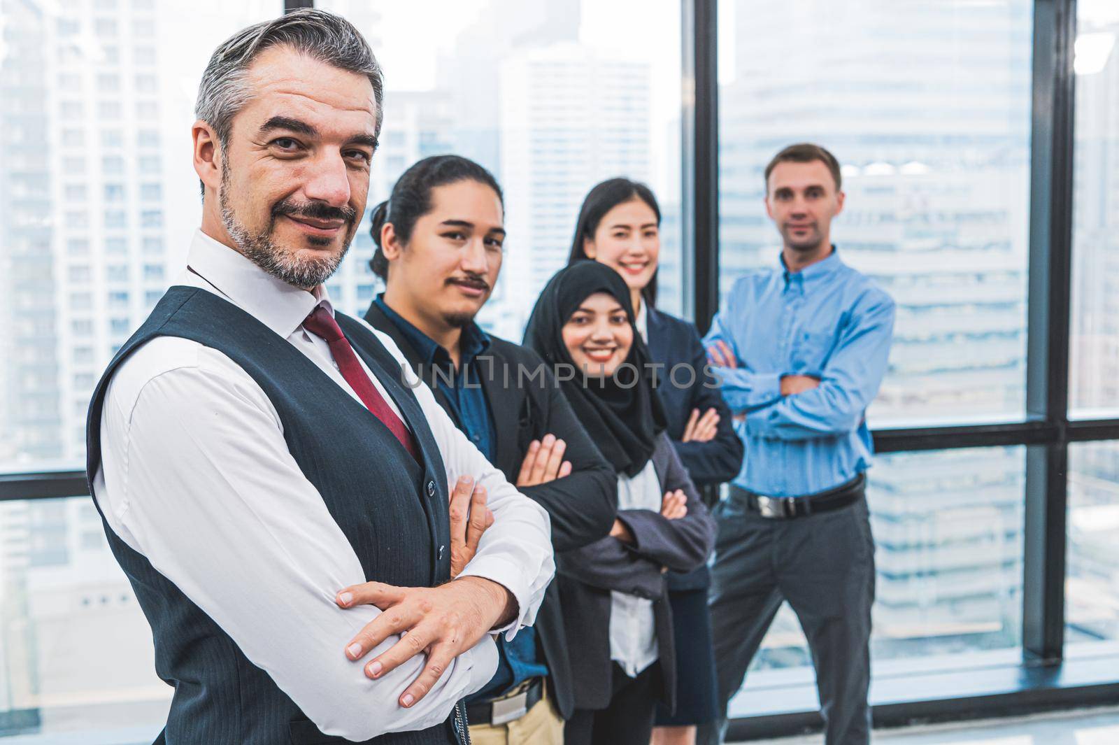 Portrait of business people group having confident in successful job in modern office background. People lifestyle and partnership colleague concept. Teamwork and cooperation diversity and multi-ethics