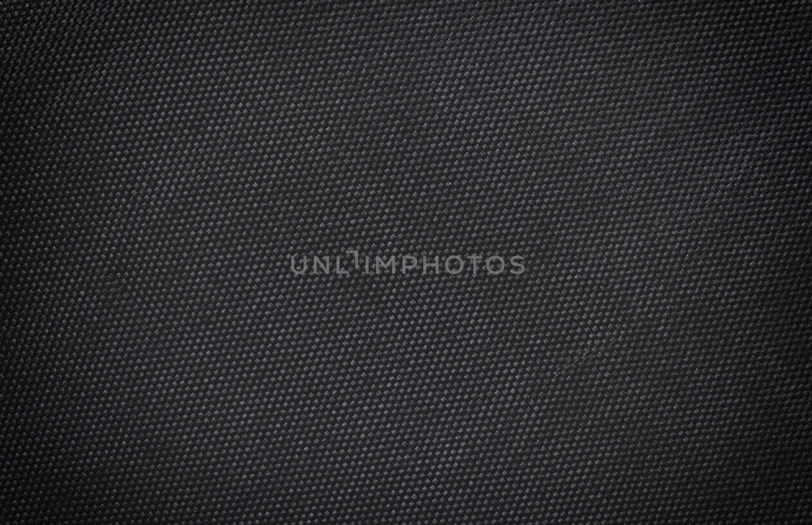 Black fabric canvas silk texture background. Abstract closeup detail of textile material wallpaper.