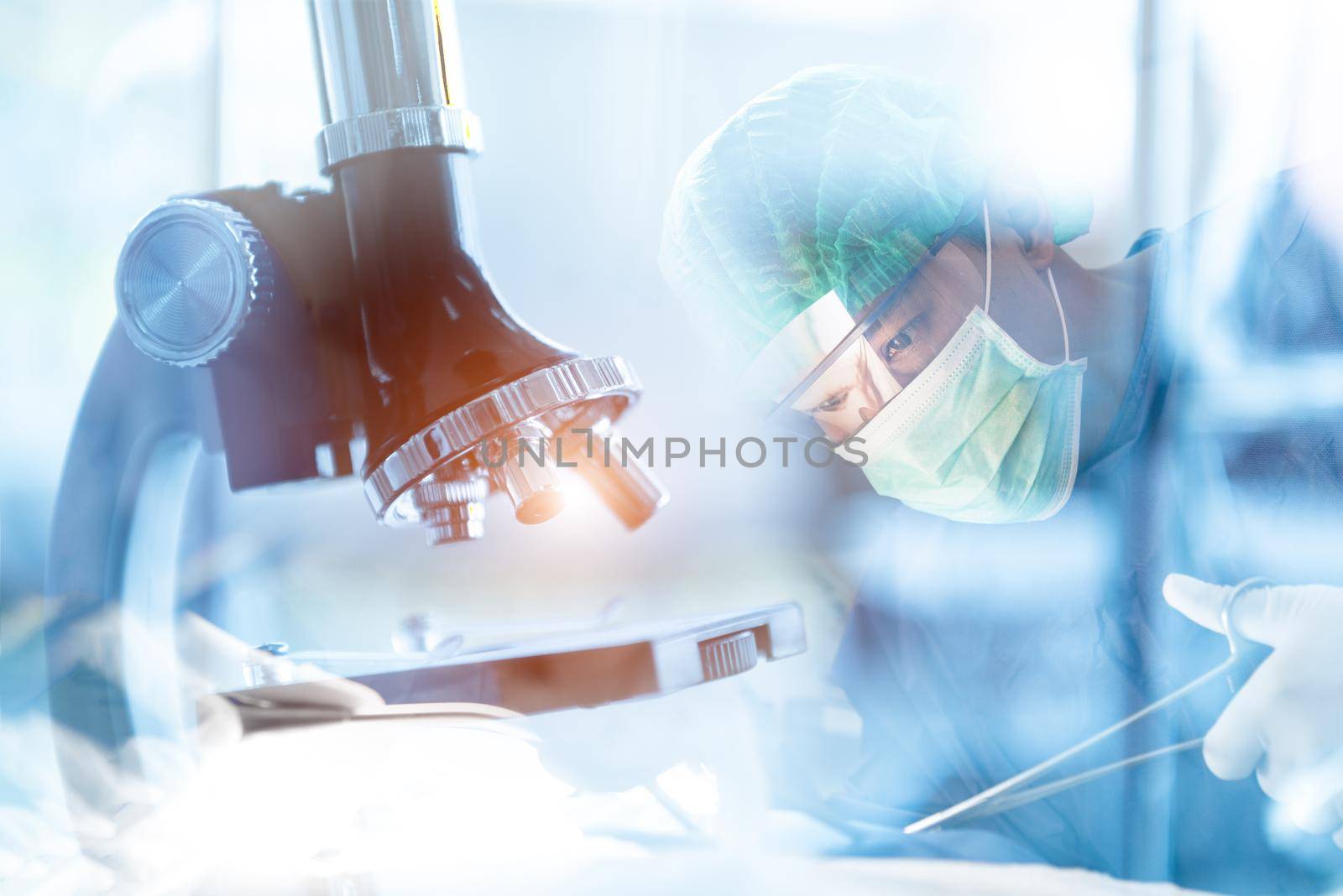 Medical laboratory microscope with Asian surgery doctor in operation room. Medical and healthcare research concept. Clinic and Hospital theme. Double exposure background