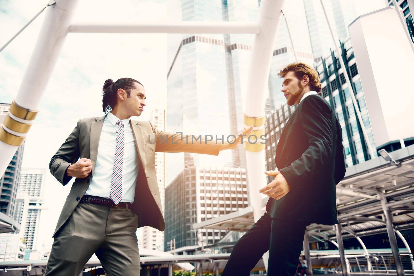 Angry businessmen push competitor from market share in imagine. Business marketing and Teamwork idea concept. Soft and split cross processing tone pinterest and instragram like process.