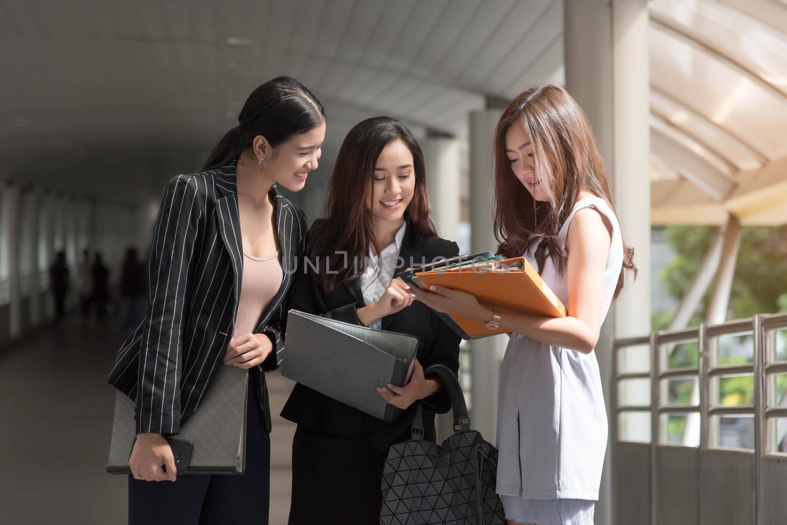 Business women looking and consulting at the report, Business concept, Beauty Concept