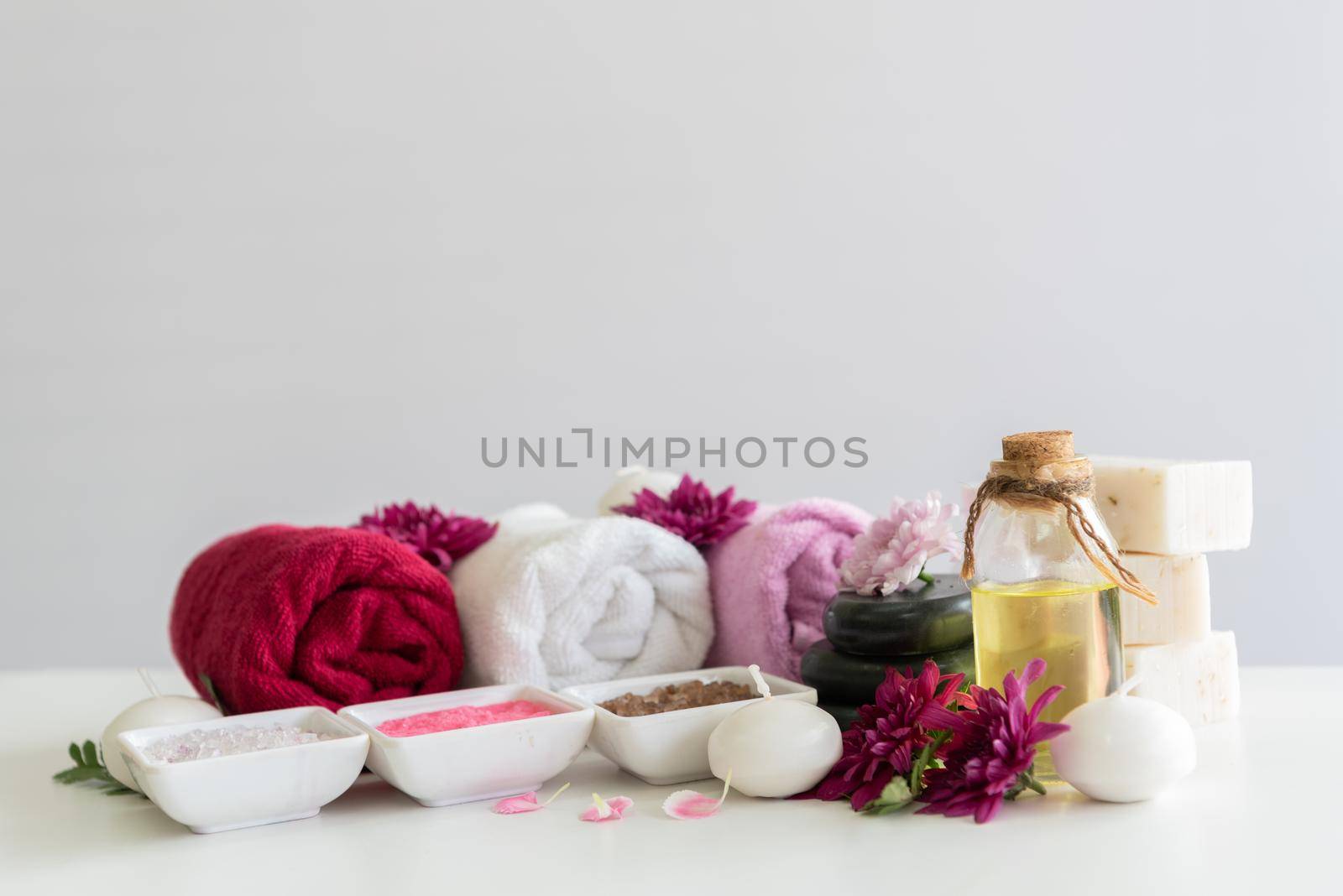 Spa treatments set on white wooden table. Healthcare and body therapy massage concept. Beauty and Healthy theme.