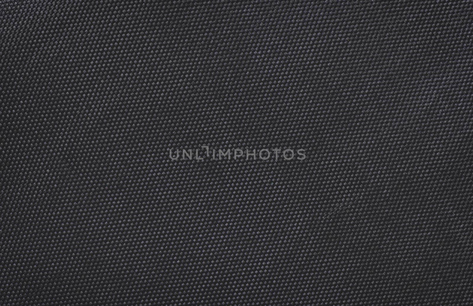 Black fabric canvas silk texture background. Abstract closeup detail of textile material wallpaper.