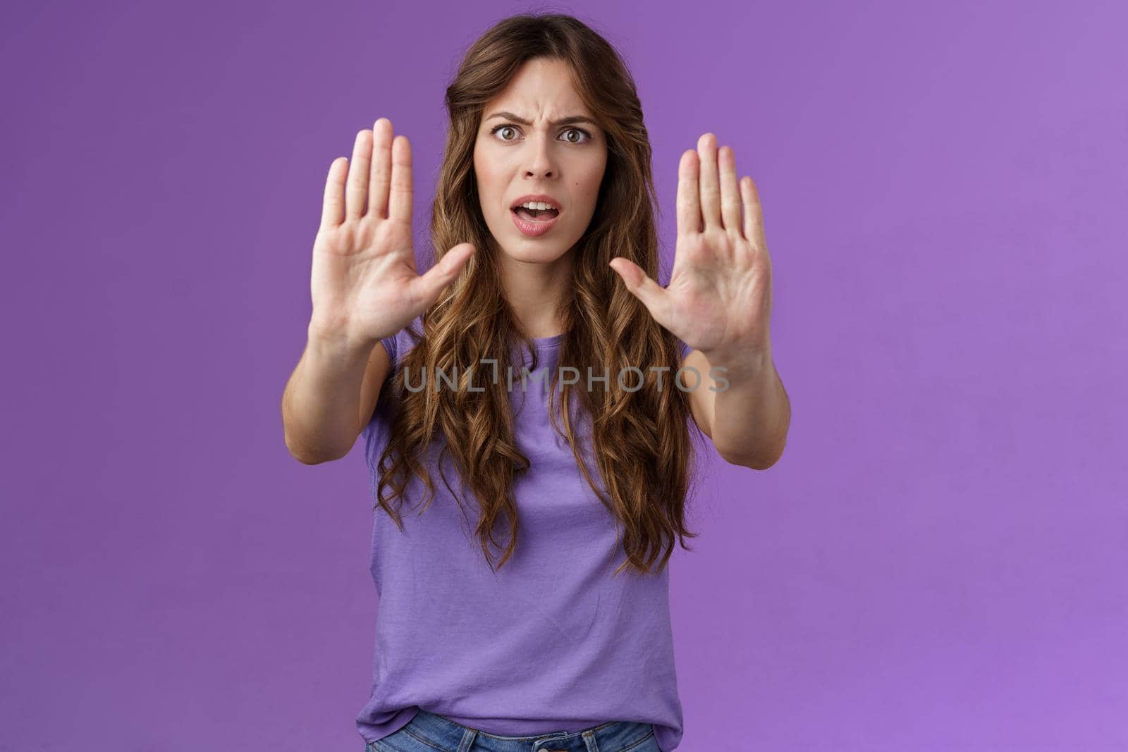 You need stop hold it. Serious-looking intense displeased woman pull hands prohibition taboo sign frowning demand enough shooting me bad mood restict doing mistake purple background by Benzoix