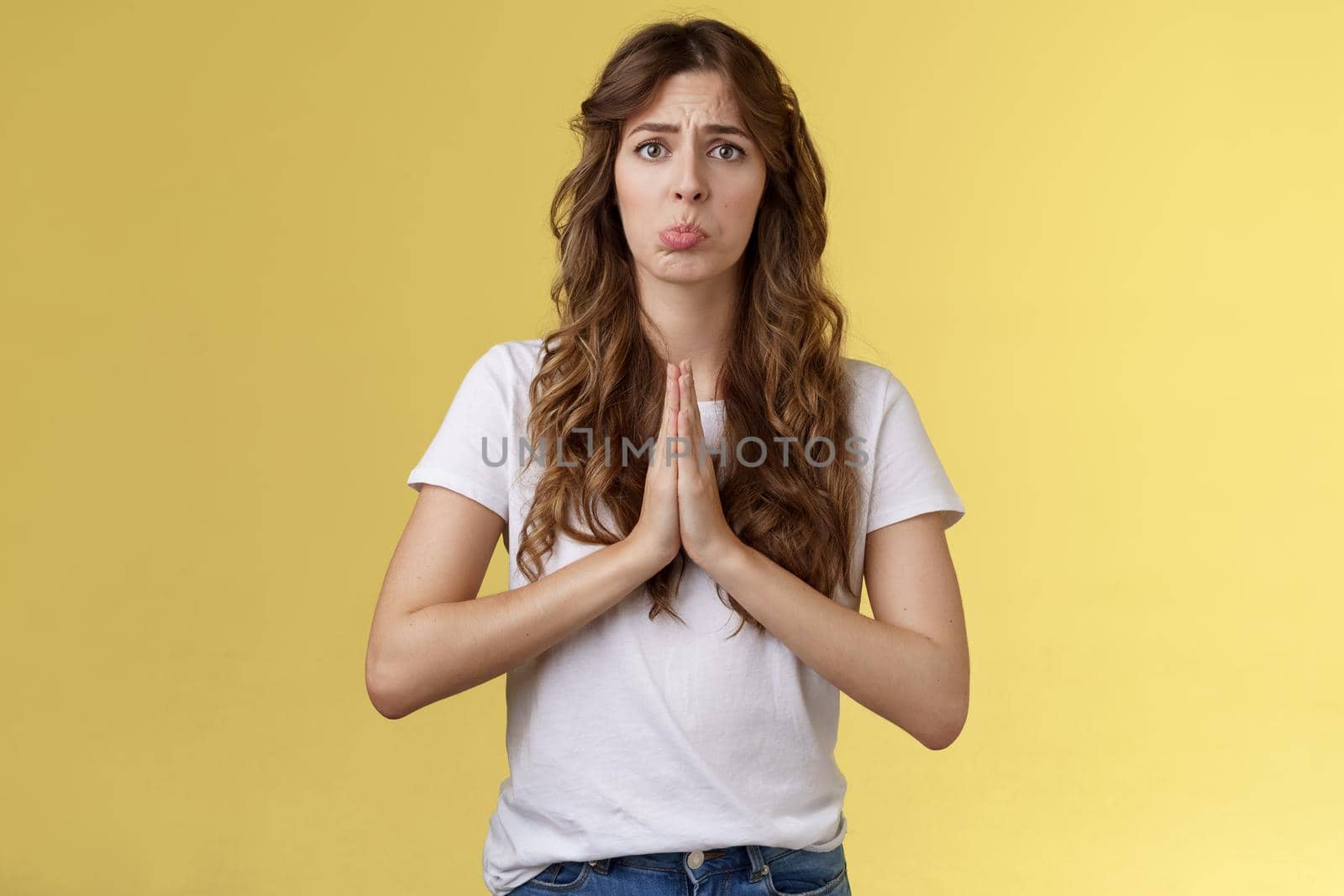 Pretty please need help asap. Sad cute get pity sobbing pulling begging face hold hands pray supplicating pleading offer frowning innocent timid expression stand yellow background by Benzoix