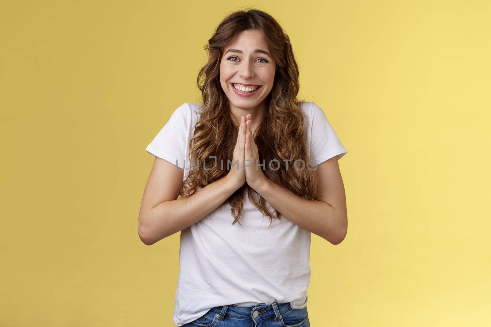 Girl grateful effort thanking dearly bottom heart appreciate help smiling delighted cheerfully make namaste gesture hold palms together pray supplication grinning hopefully asking favor.