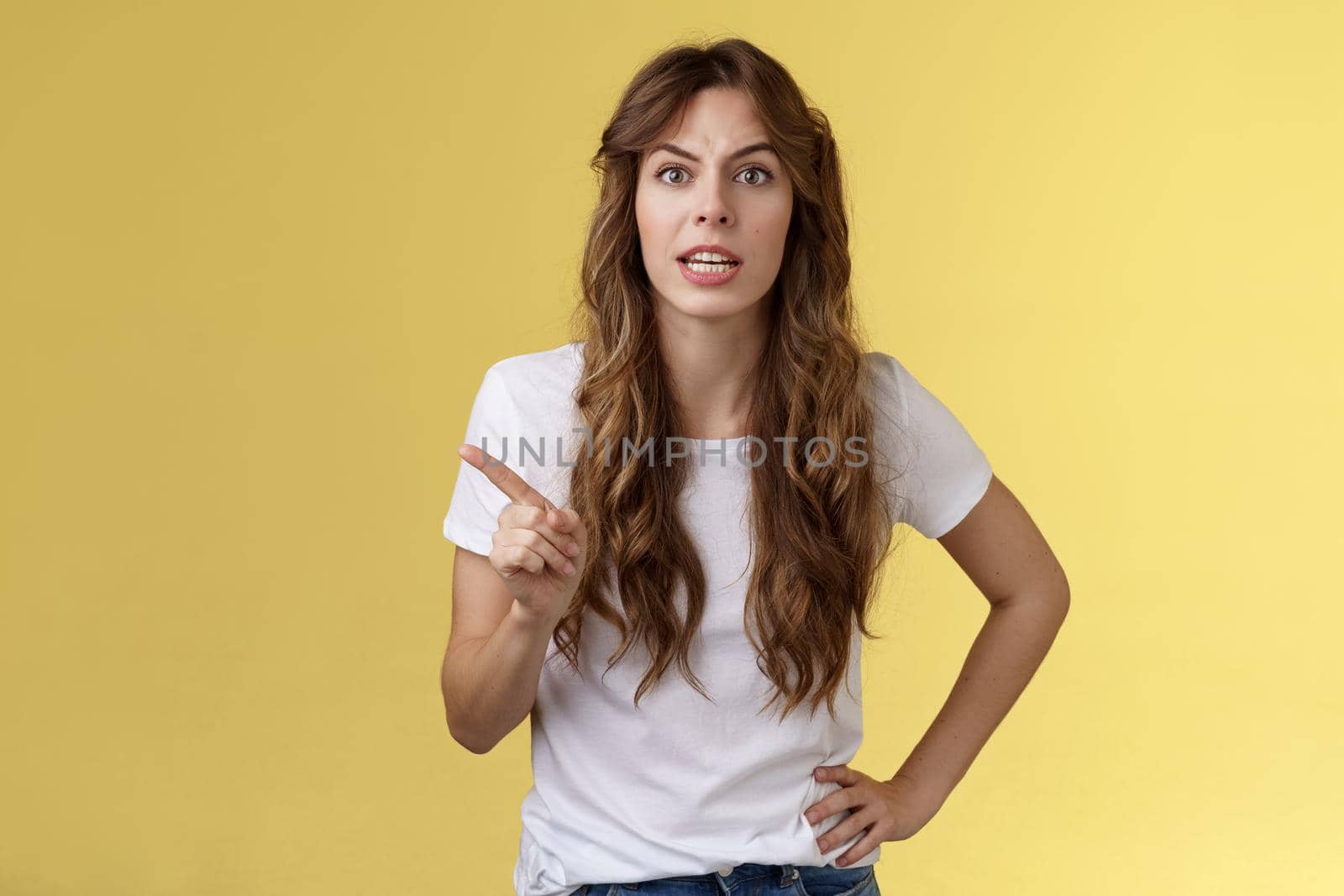 Dont call me baby. Pissed annoyed curly-haired girlfriend complaining bad behaviour forbid something shaking one finger stop enough rejection gesture arguing frowning disappointed angry.