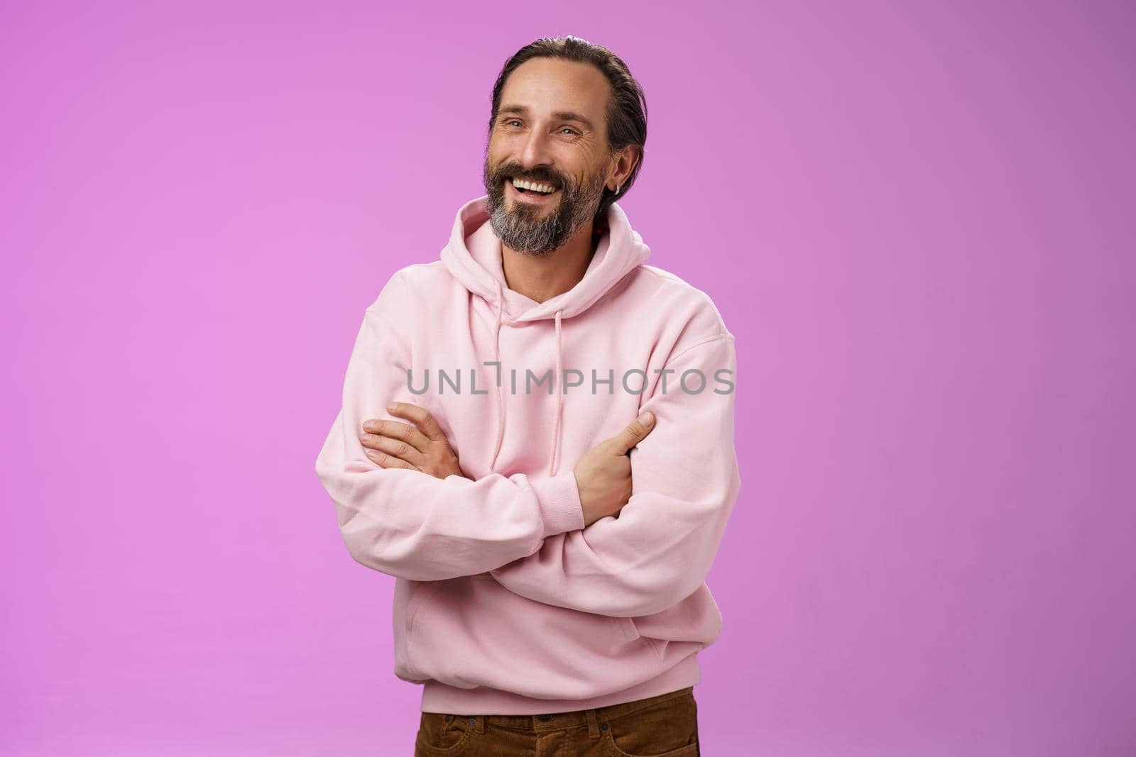 Prooud successful dreamy happy adult bearded man vacation enjoying carefree life laughing happily cross arms chest confident look aside accomplished successful business good wealthy life by Benzoix