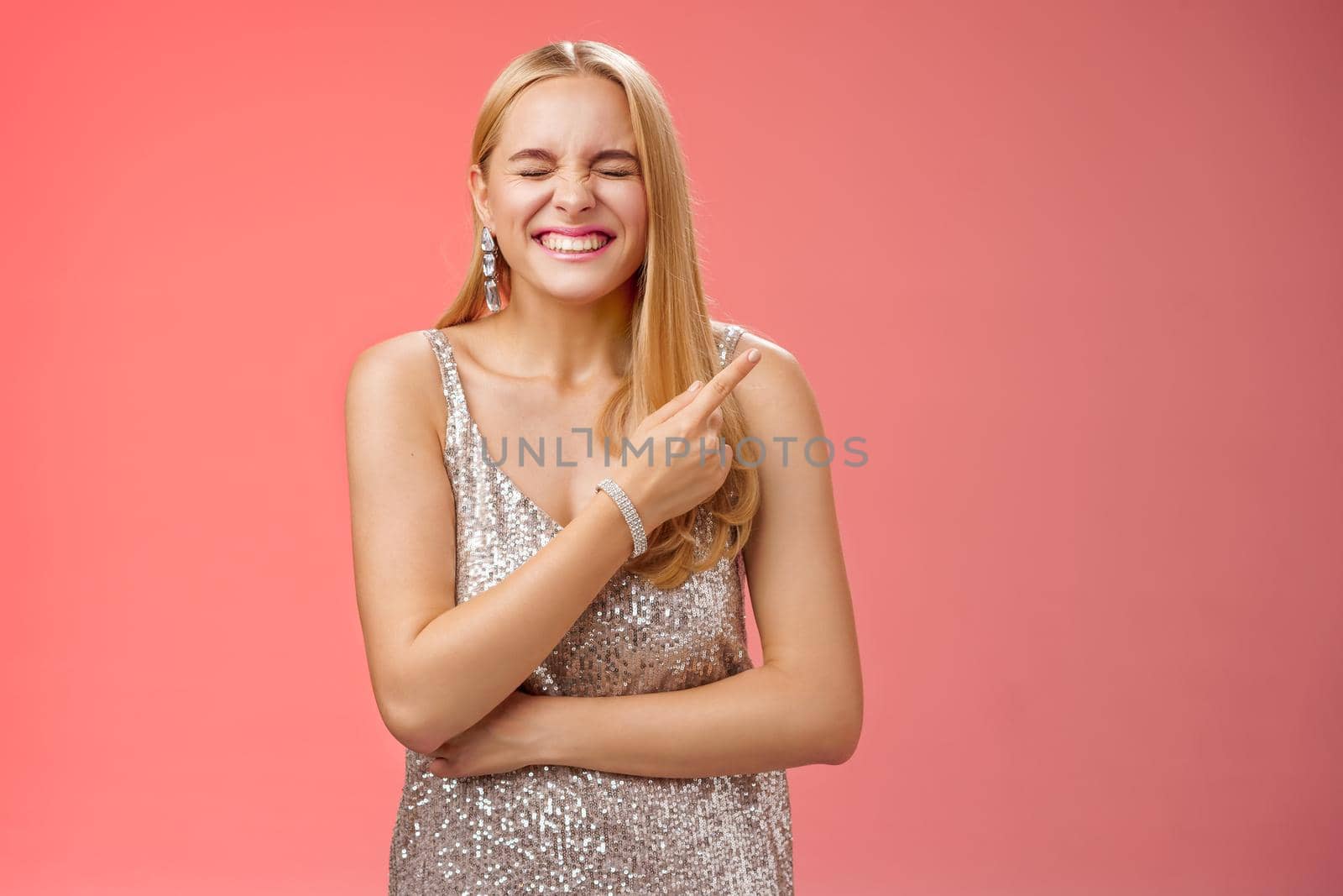 Attractive excited happy charming blond girl attend luxurious party see famous person feel lucky amused close eyes grinning joyfully pointing delighted behind upper right corner enjoy event by Benzoix