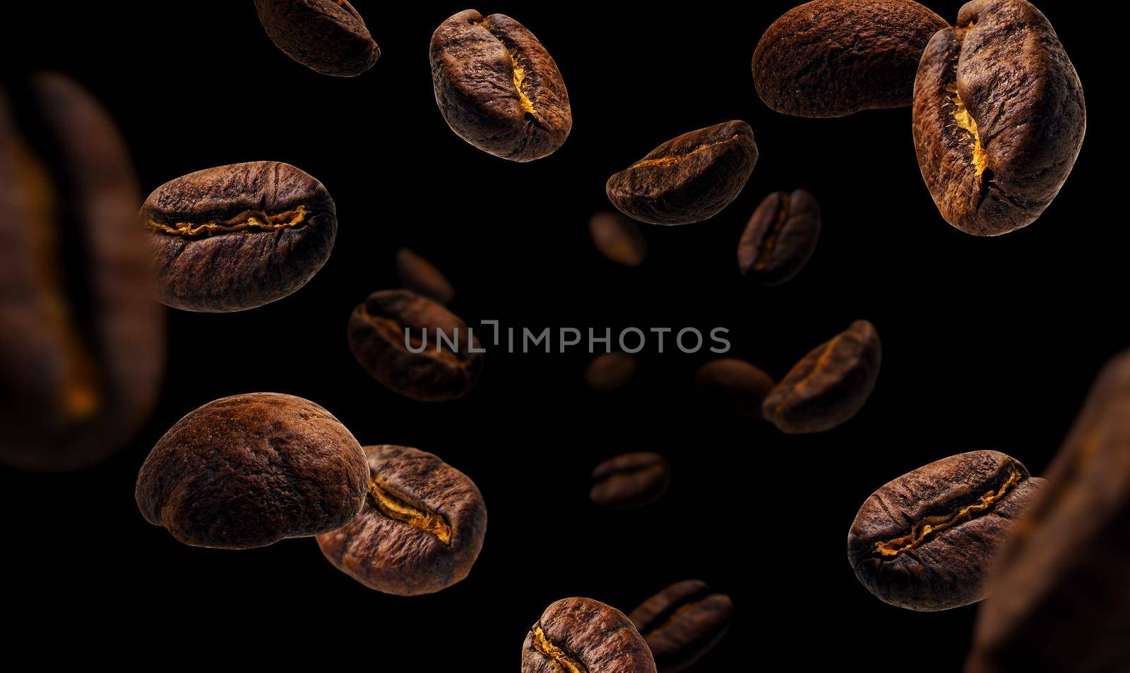Coffee beans levitate on a black background.