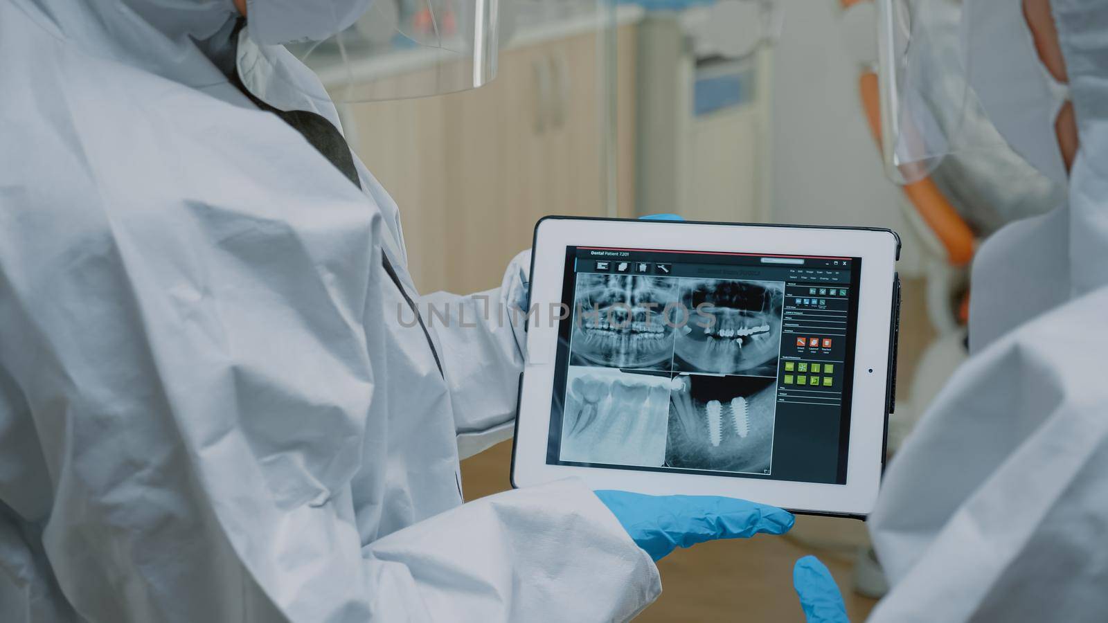 Close up of teeth radiography scan on modern tablet by DCStudio