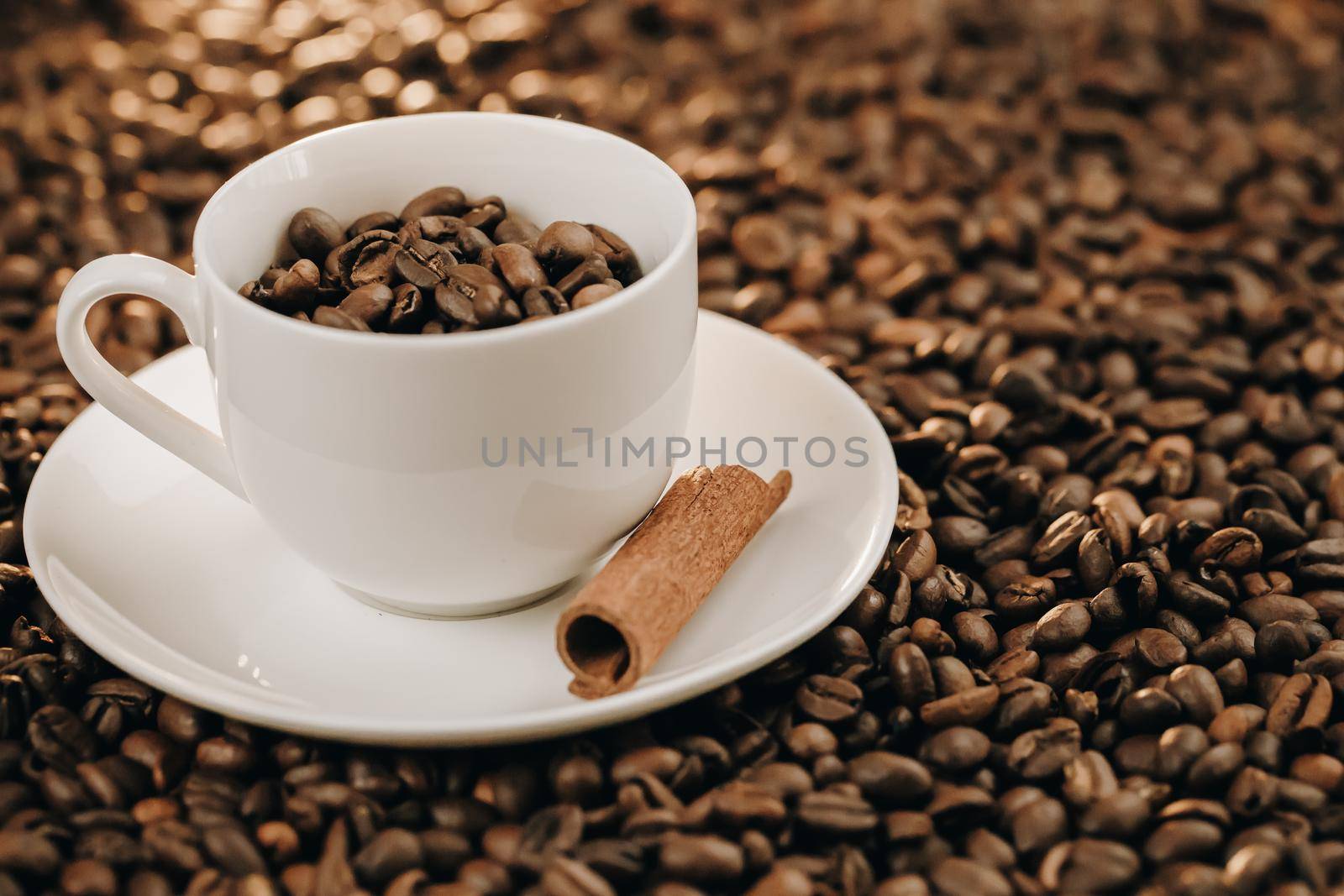 Coffee cup and saucer on a wooden table by uflypro