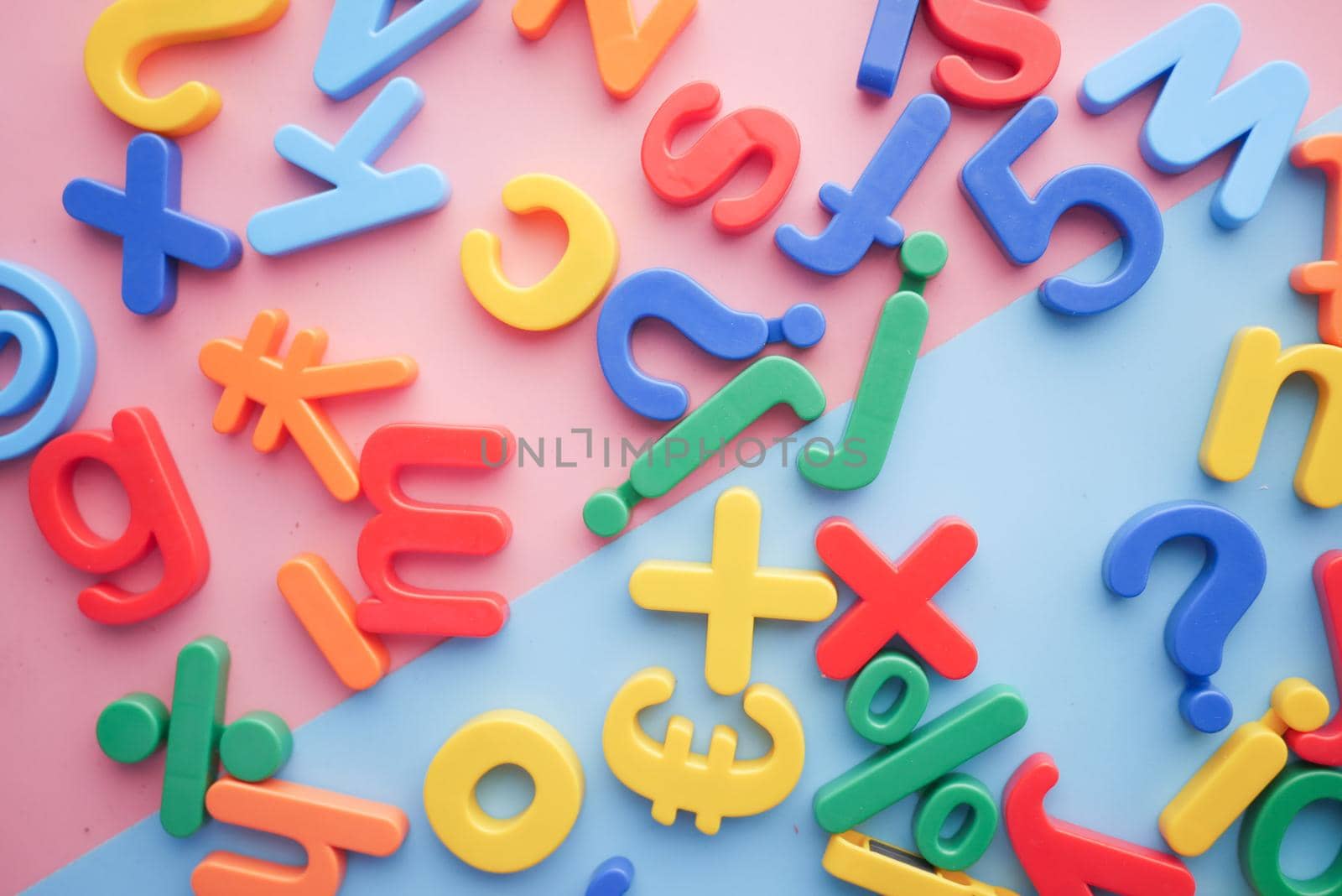 colorful plastic letters on color background, Top view by towfiq007