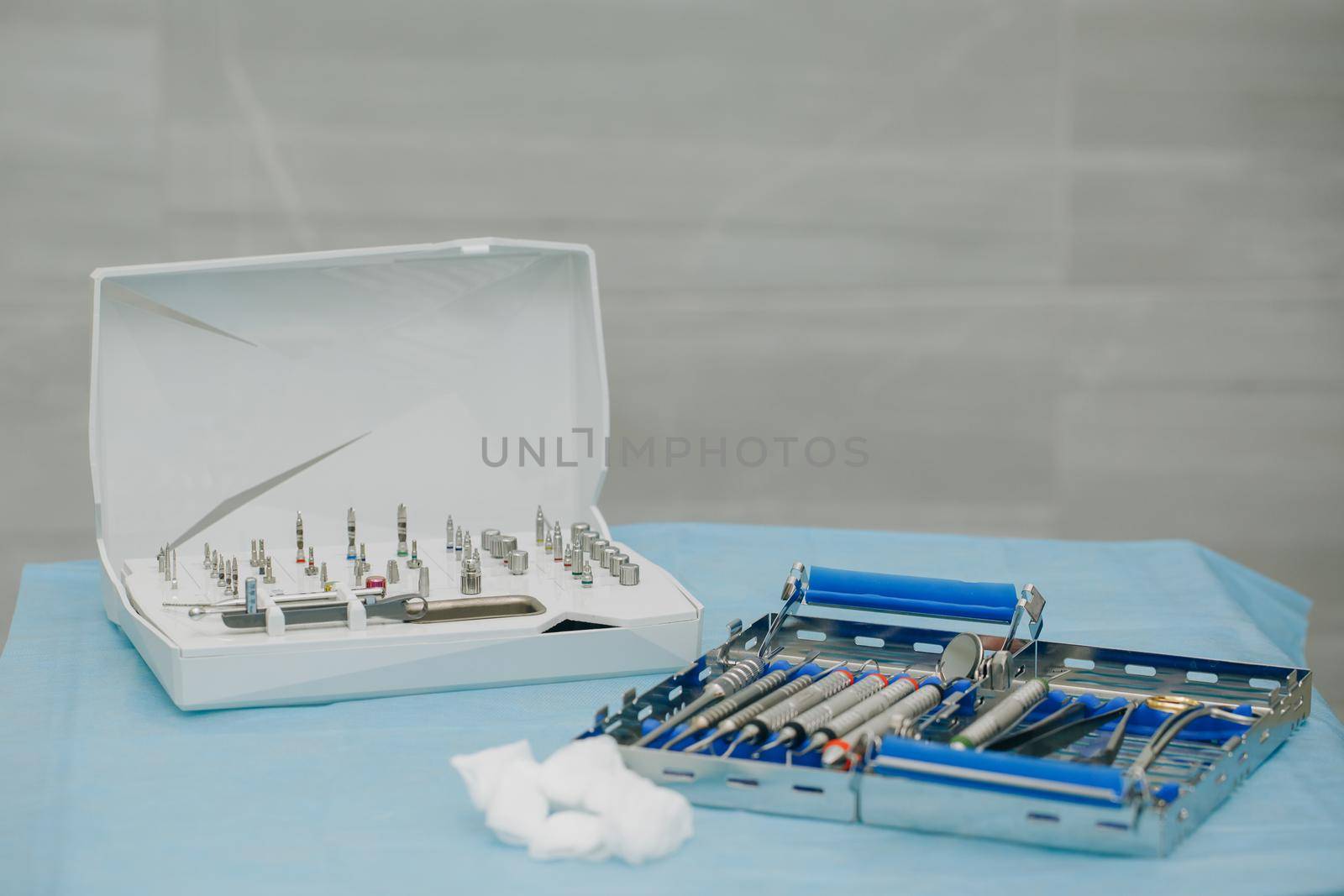 Surgical kit of instruments used in dental implantology. Dentist orthopedist tools. Dentistry. Dental implantation surgical set.