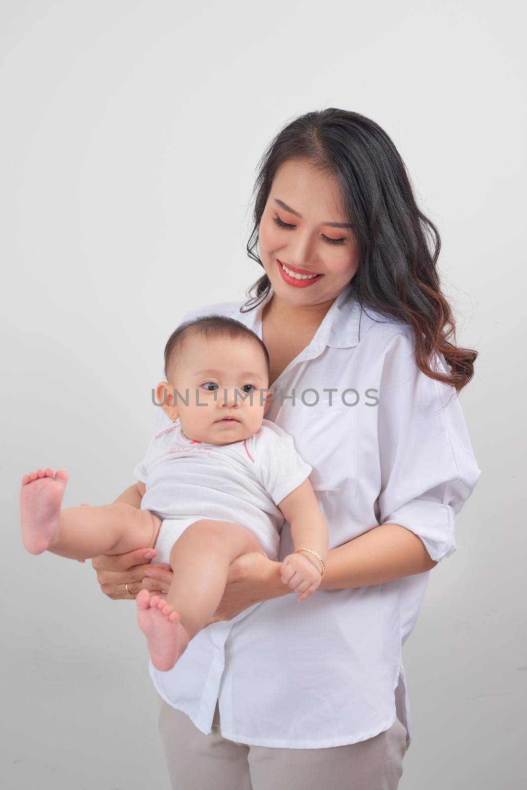 portrait of young asian family relaxing