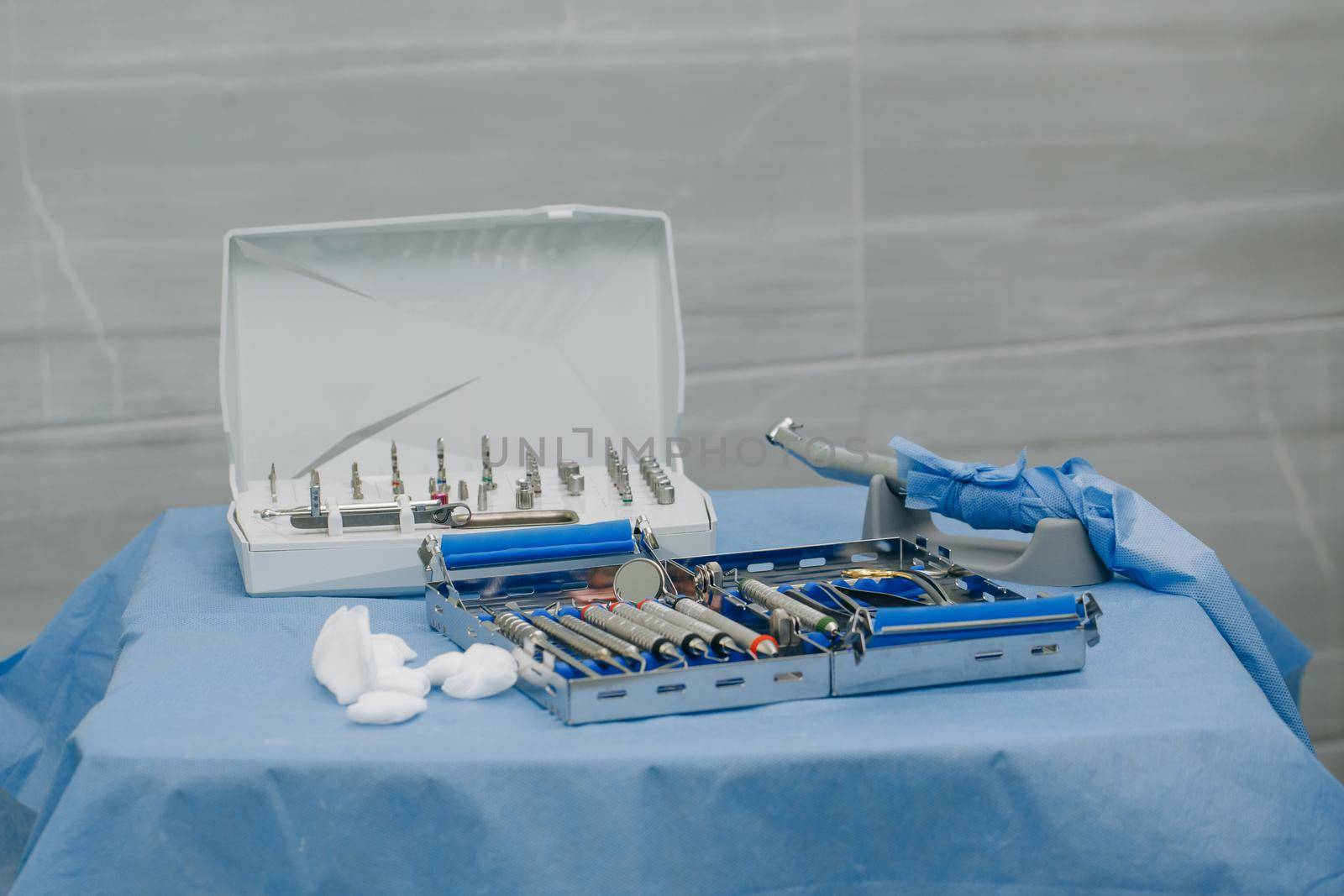 Surgical kit of instruments used in dental implantology. Dental implantation surgical set. Dentist orthopedist tools.