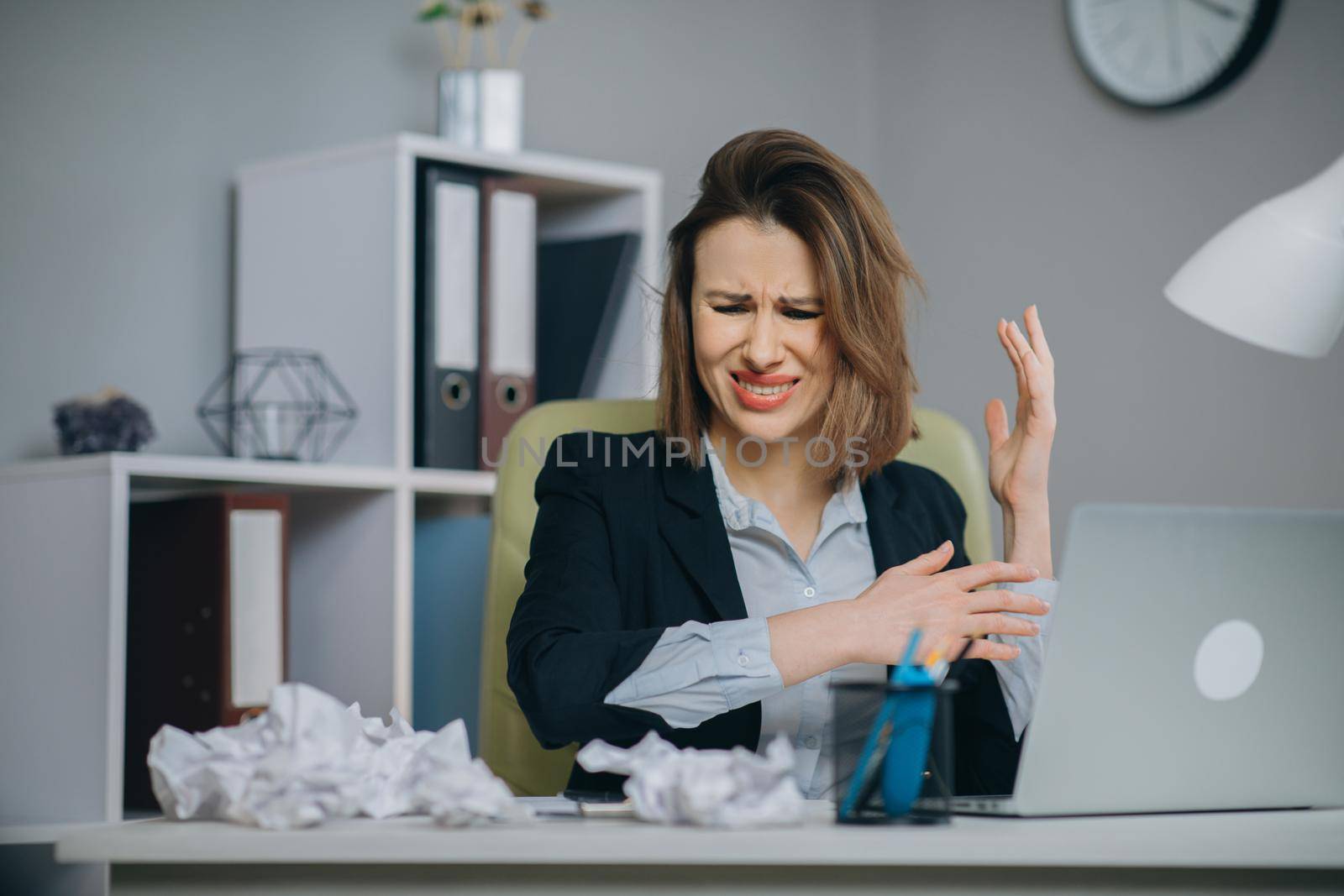 Stressed businesswoman annoyed using stuck laptop, angry woman mad about computer problem frustrated with data loss, online mistake, software error or system failure by uflypro