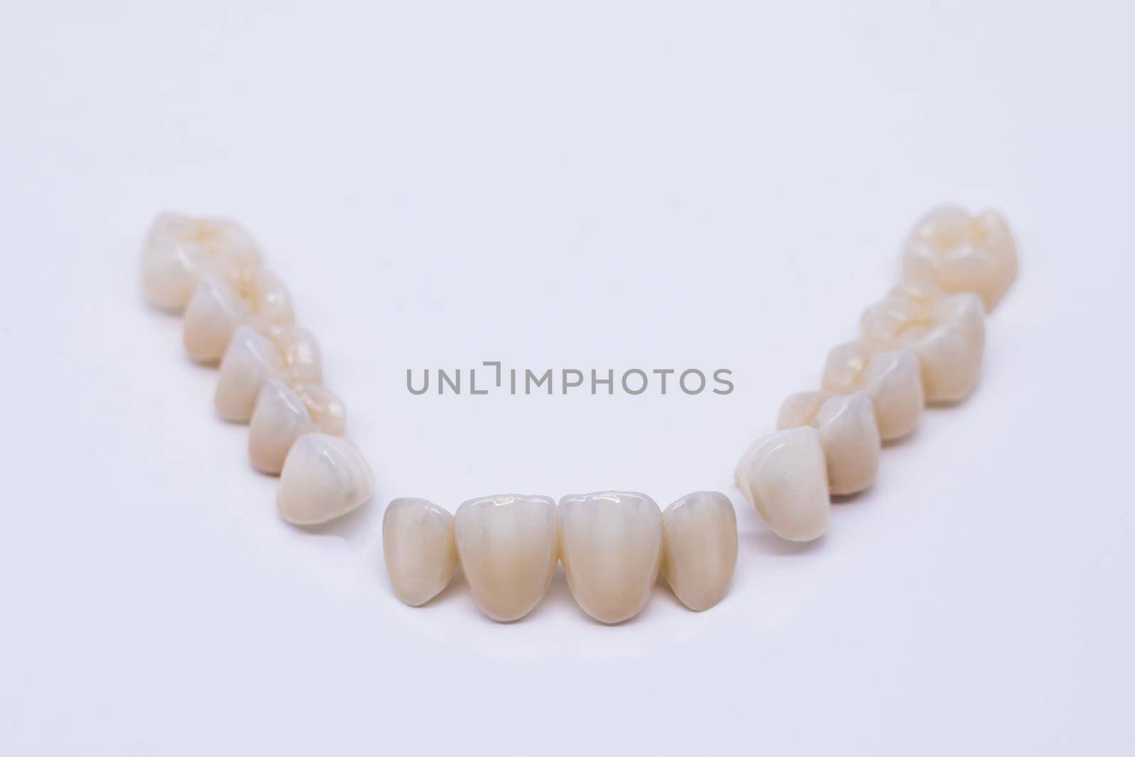Ceramic zirconium in final version. Staining and glazing. Precision design and high quality materials. Metal Free Ceramic Dental Crowns. by uflypro