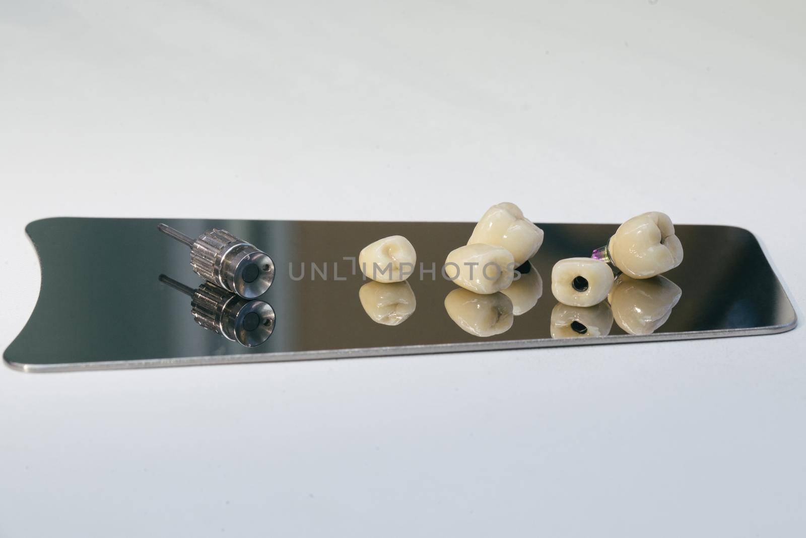 Detail of dental implant, crown elements on zirconium oxide by uflypro