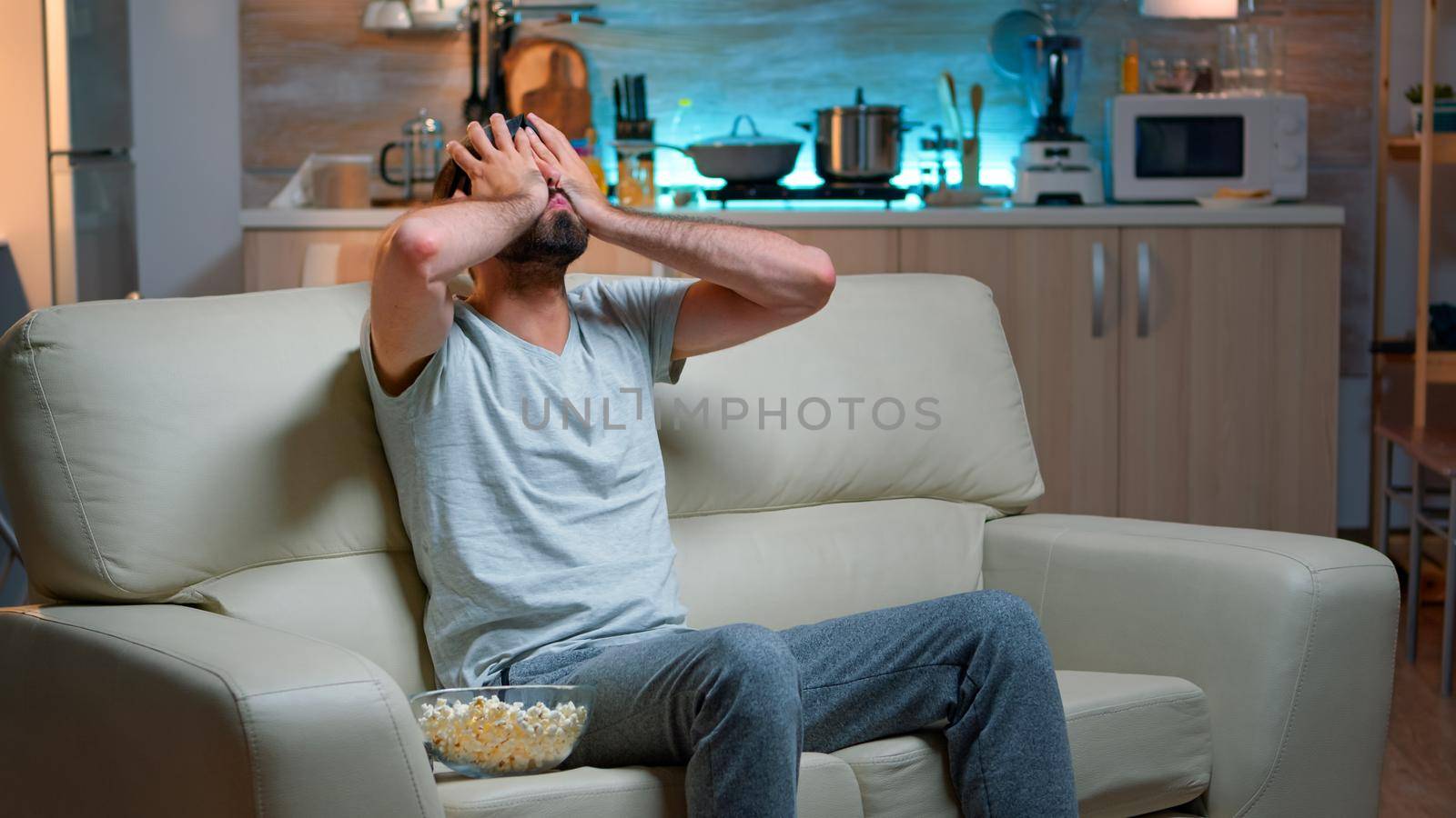 Defeat man playing games on television during online competition by DCStudio
