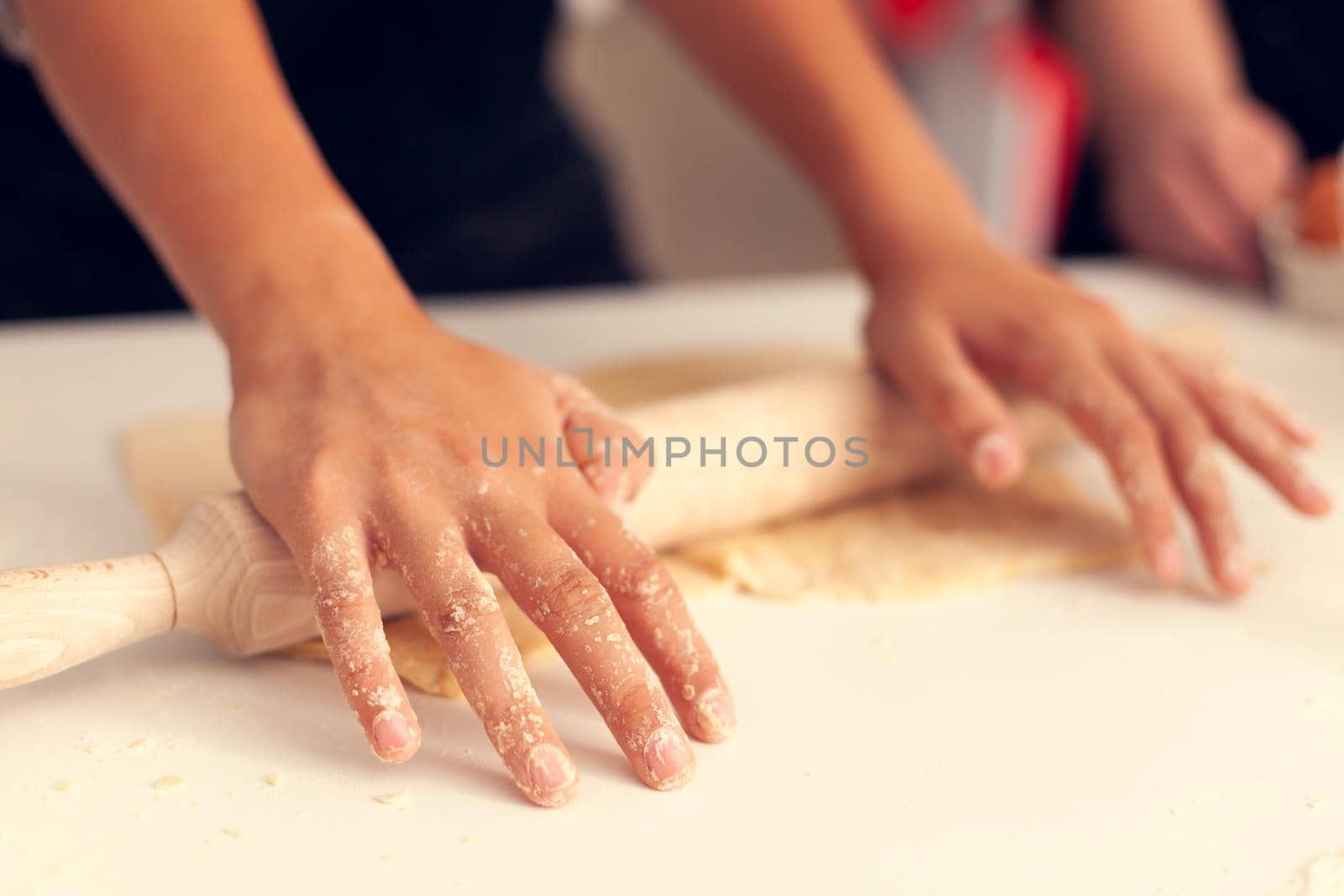 Granddaughter knead dough on christmas day by DCStudio