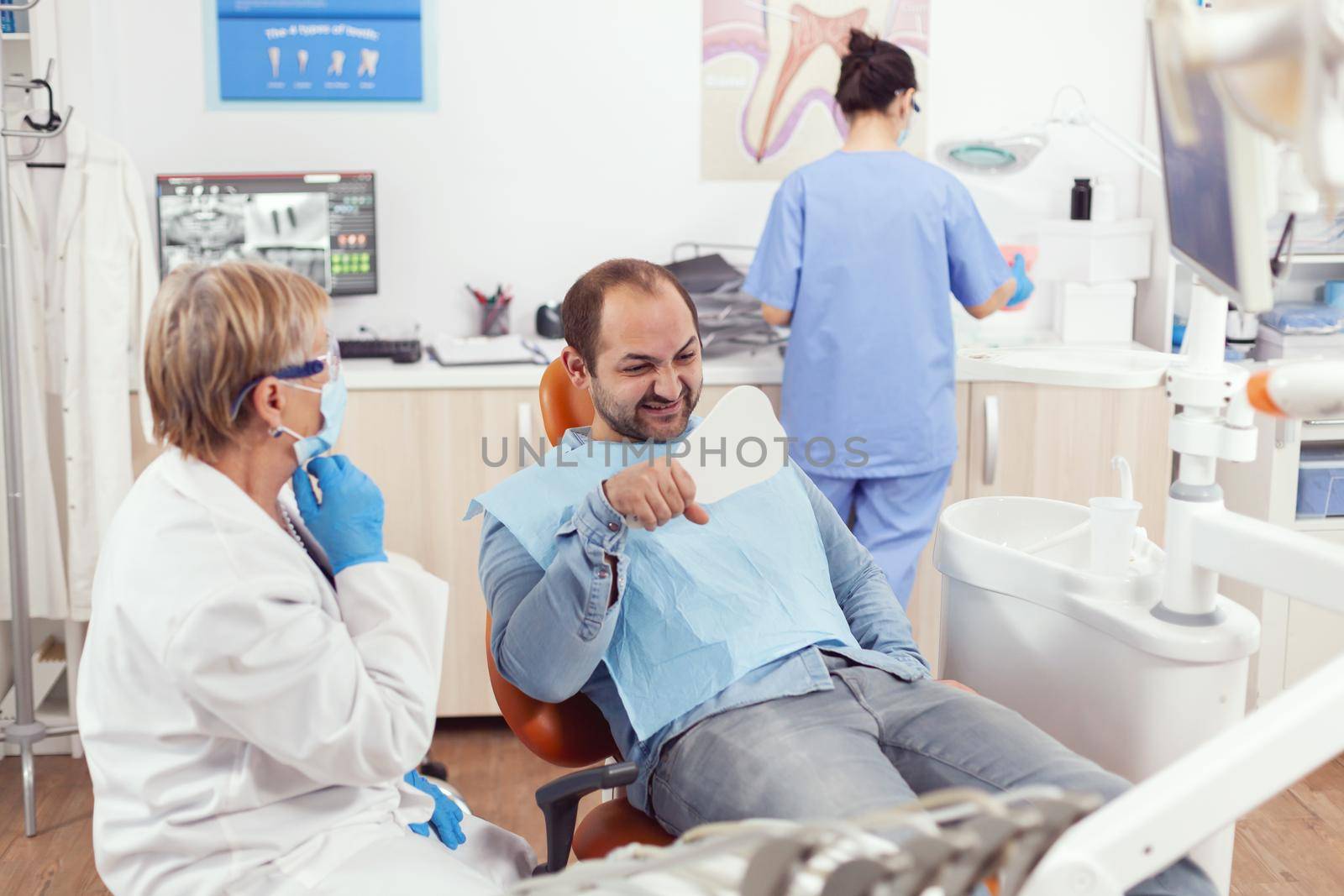 Sick patient checking health teeth analyzing surgery procedure by DCStudio