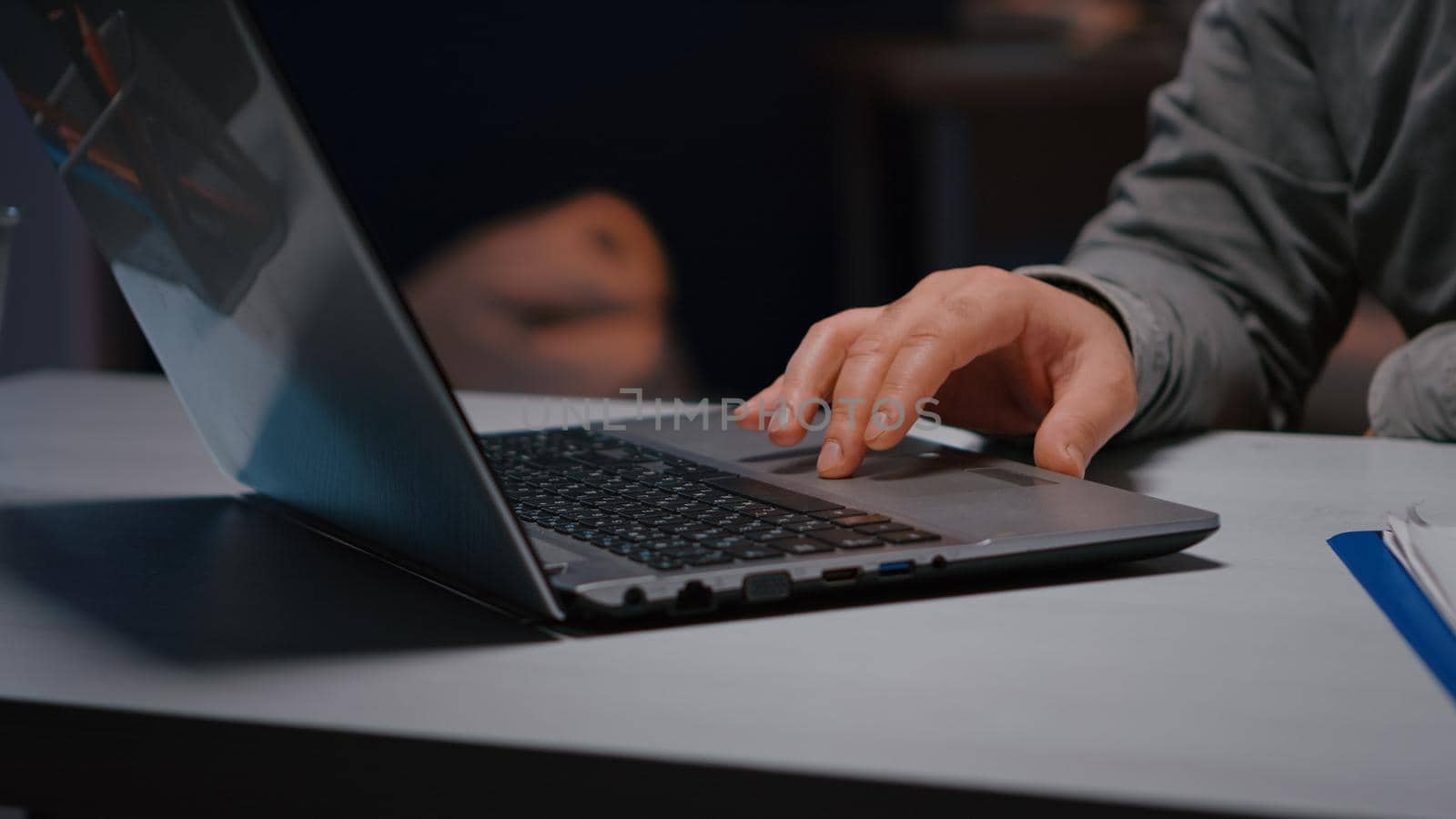 Close-up of executive man hands answering negotiations email by DCStudio