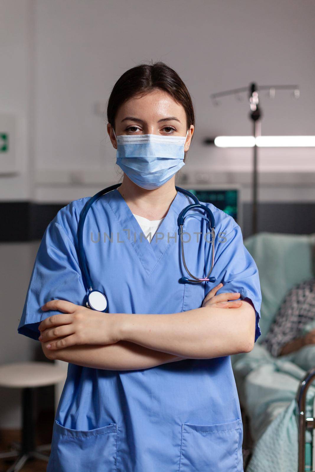 Portrait of medical nurse with chirurgical mask by DCStudio