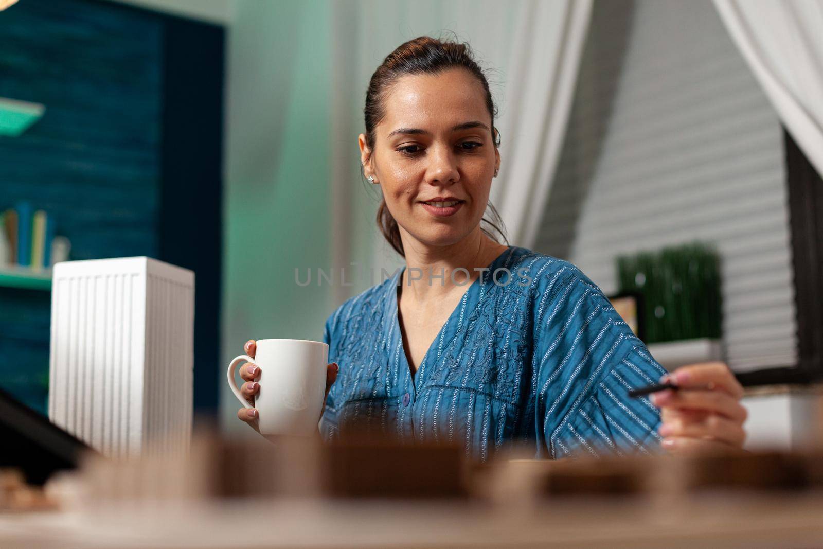 Portrait of technical architect looking at maquette plan by DCStudio