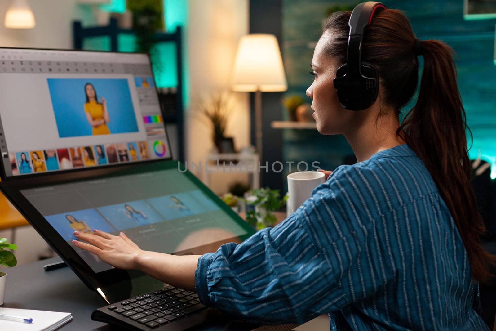 Woman with editor occupation wearing headphones by DCStudio