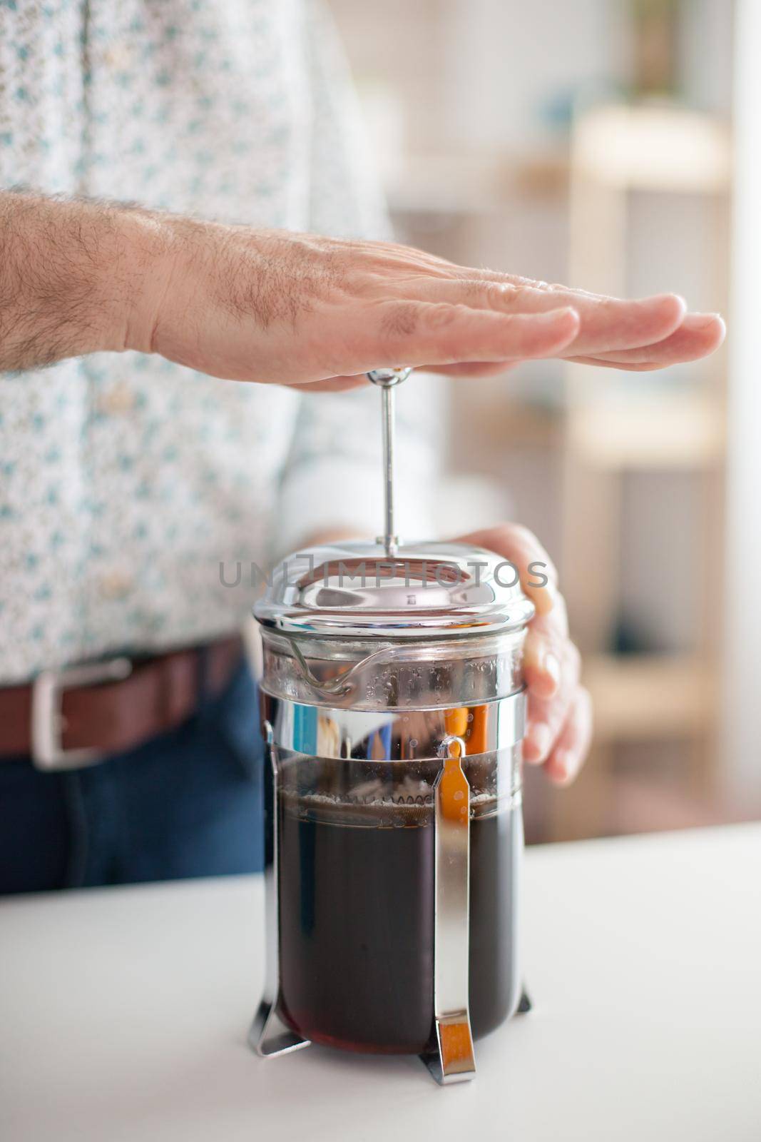 Making coffee using french press by DCStudio