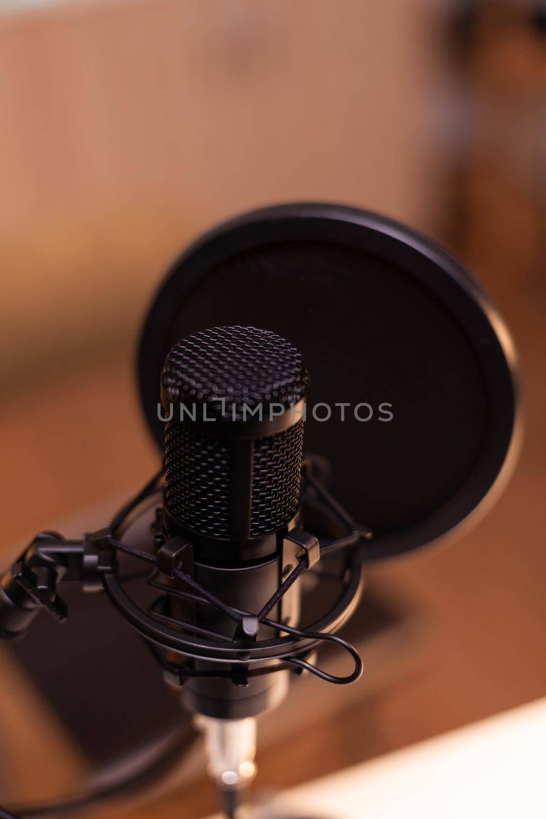 Close up of microphone at recording studio, technology and audio equipment. Recording social media content with production microphone, digital web internet streaming station
