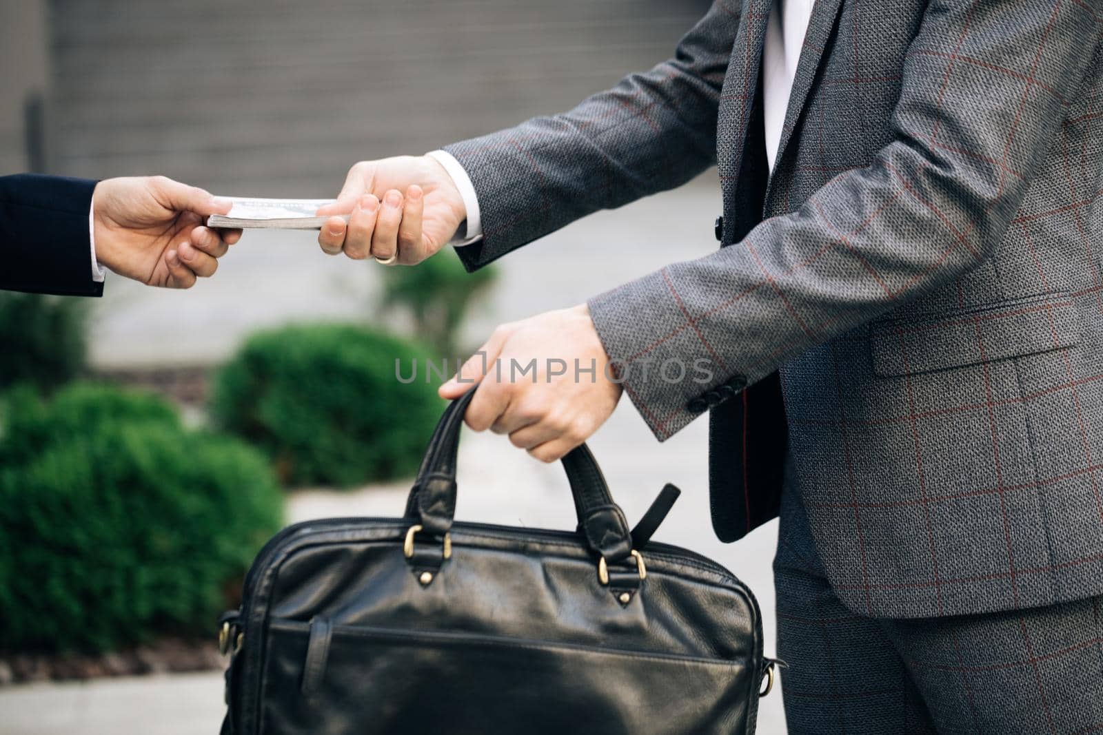 Two unrecognized business partners shaking hands. Colleagues just made good deal. Business relationship. Successfully made deal. Handshake - business people shaking hands by uflypro