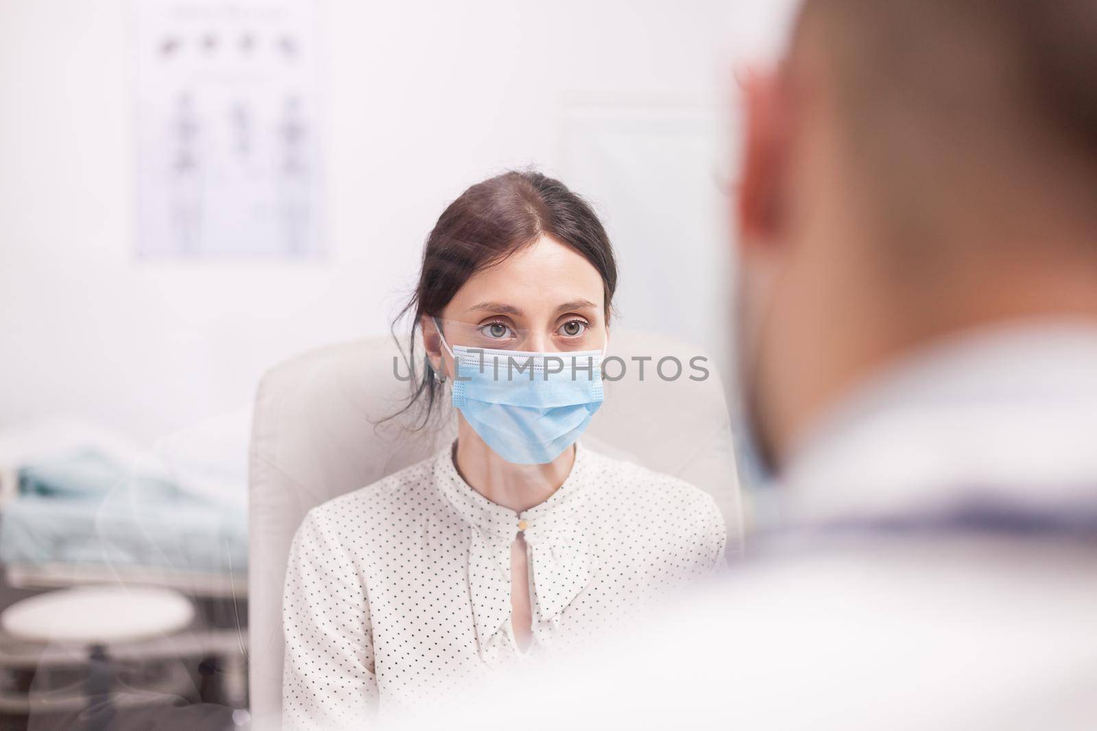 Shot of patient with protection mask by DCStudio