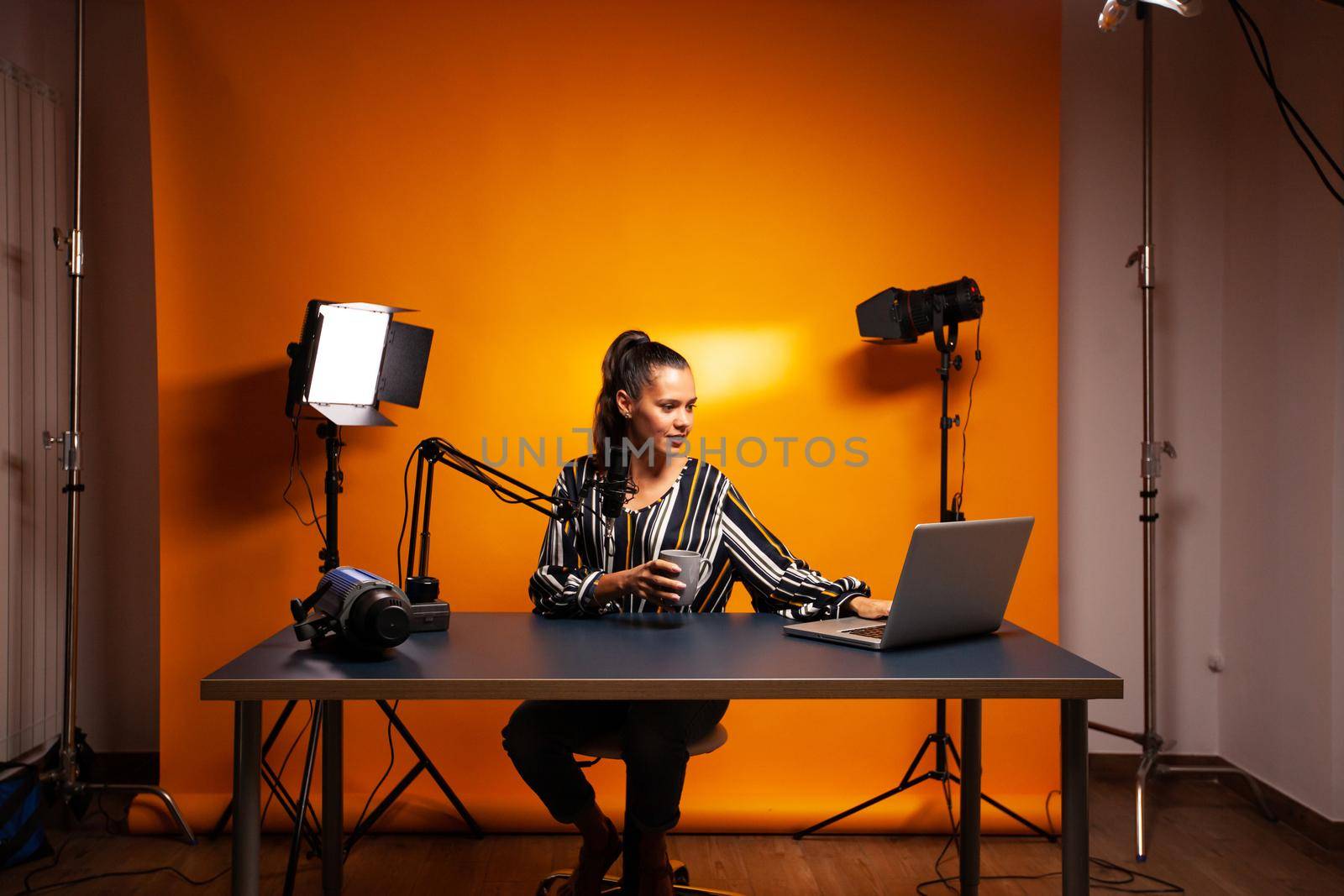 Filmmaker recording podcast for famous vlogger. Content creator new media star on social media recording for internet web online subscribers audience new podcast episode
