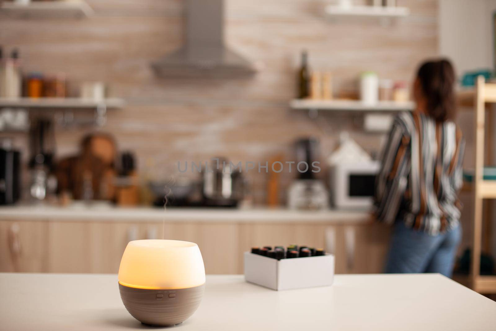 Essential oils diffuser distributing aromatherapy by DCStudio